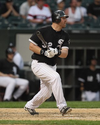 CHICAGO, IL - MAY 22: Adam Dunn #32 of the Chicago White Sox hits a run-scoring single in the 8th inning against the Los Angeles Dodgers at U.S. Cellular Field on May 22, 2011 in Chicago, Illinois. The White Sox defeated the Dodgers 8-3. (Photo by Jonat CHICAGO, IL - MAY 22: Adam Dunn #32 of the Chicago White Sox hits a run-scoring single in the 8th inning against the Los Angeles Dodgers at U.S. Cellular Field on May 22, 2011 in Chicago, Illinois. The White Sox defeated the Dodgers 8-3. (Photo by Jonat