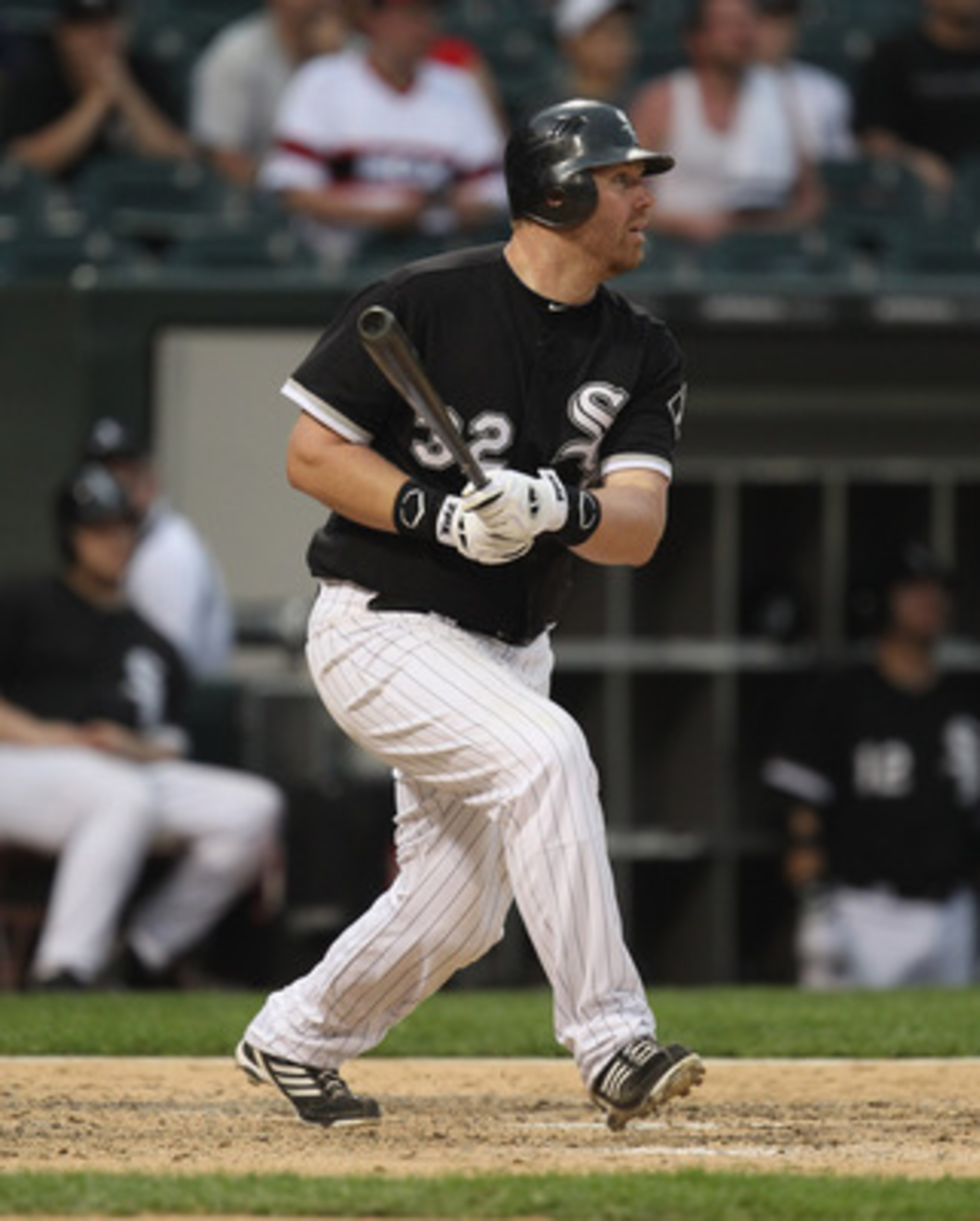CHICAGO, IL - MAY 22: Adam Dunn #32 of the Chicago White Sox hits a run-scoring single in the 8th inning against the Los Angeles Dodgers at U.S. Cellular Field on May 22, 2011 in Chicago, Illinois. The White Sox defeated the Dodgers 8-3. (Photo by Jonat CHICAGO, IL - MAY 22: Adam Dunn #32 of the Chicago White Sox hits a run-scoring single in the 8th inning against the Los Angeles Dodgers at U.S. Cellular Field on May 22, 2011 in Chicago, Illinois. The White Sox defeated the Dodgers 8-3. (Photo by Jonat