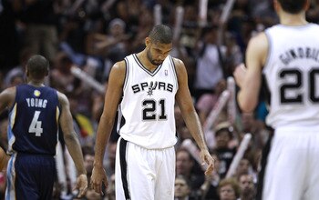 SAN ANTONIO, TX - APRIL 27:  Tim Duncan #21 of the San Antionio Spurs looks on against the Memphis Grizzlies in Game Five of the Western Conference Quarterfinals in the 2011 NBA Playoffs on April 27, 2011 at AT&T Center in San Antonio, Texas. NOTE TO USER