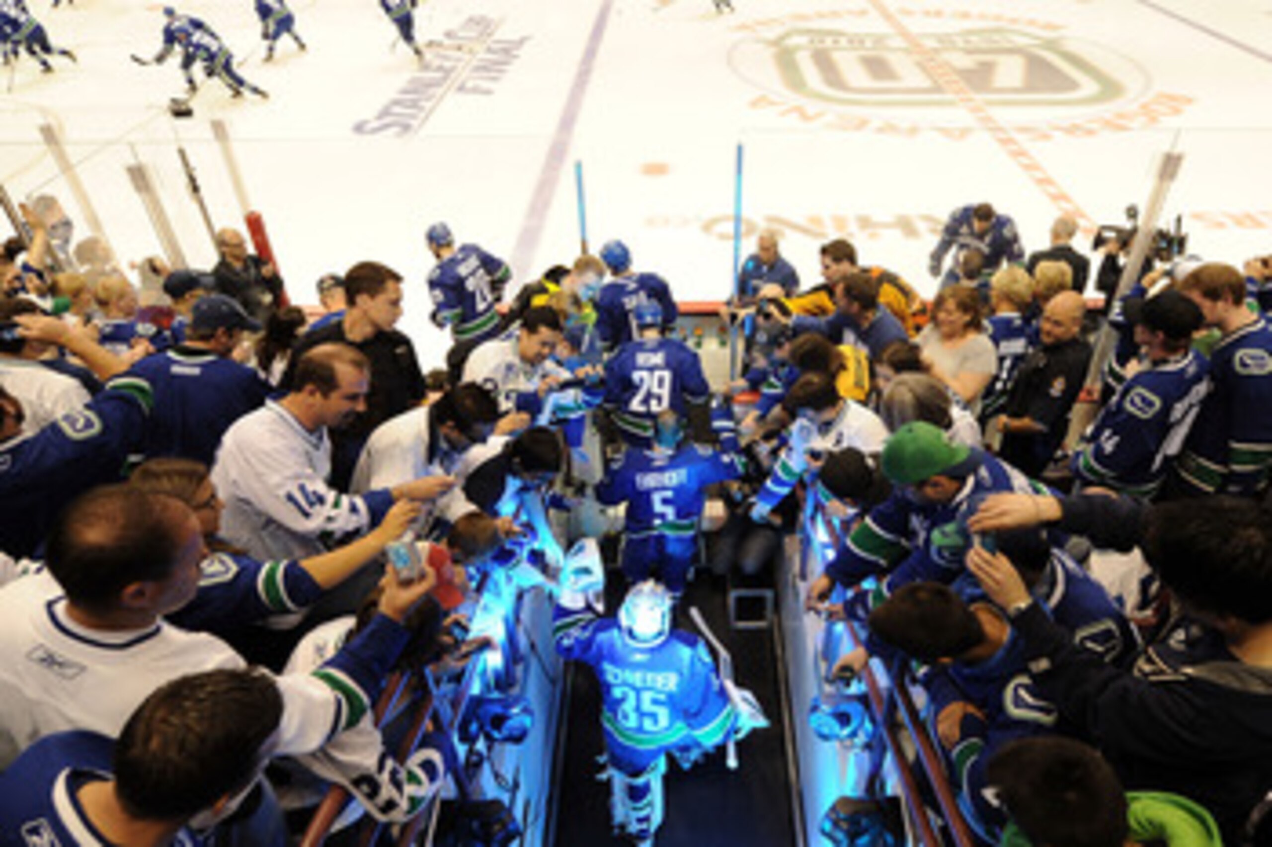 VANCOUVER, BC - JUNE 01:  The Vancouver Canucks walk on to the ice prior to game one against the Boston Bruins in the 2011 NHL Stanley Cup Finals at Rogers Arena on June 1, 2011 in Vancouver, Canada.  (Photo by Harry How/Getty Images)