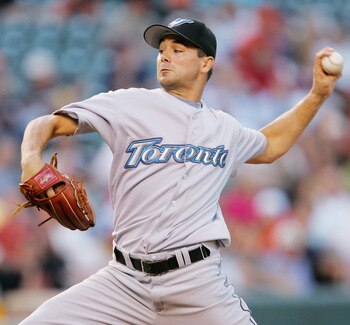 BALTIMORE - JUNE 5:  Ted Lilly #31 of the Toronto Blue Jays pitches against the Baltimore Orioles at Oriole Park at Camden Yards on June 5, 2006 in Baltimore, Maryland. The Orioles defeated the Blue Jays 4-0.  (Photo by Jamie Squire/Getty Images)