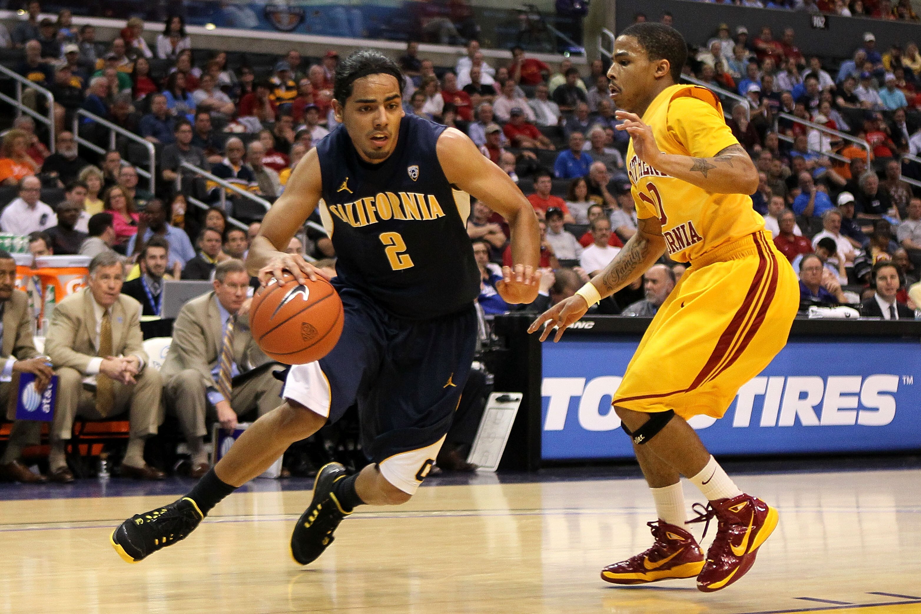 LOS ANGELES, CA - MARCH 10:  Jorge Gutierrez #2 of the California Golden Bears drives on Maurice Jones #10 of the USC Trojans in the second half in the quarterfinals of the 2011 Pacific Life Pac-10 Men's Basketball Tournament at Staples Center on March 10