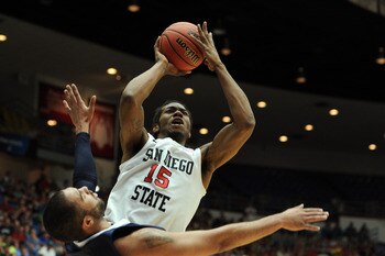 TUCSON, AZ - MARCH 17:  Kawhi Leonard #15 of the San Diego State Aztecs shoots over Taylor Montgomery #44 of the Northern Colorado Bears during the second round of the 2011 NCAA men's basketball tournament at McKale Center on March 17, 2011 in Tucson, Ari