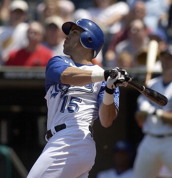 KANSAS CITY, MO - JUNE 24:  Outfielder Carlos Beltran #15 of the Kansas City Royals swings at a Detroit Tigers pitch during the game at Kauffman Stadium on June 24, 2004 in Kansas City, Missouri. The Tigers won 12-3. (Photo by Dave Kaup/Getty Images)