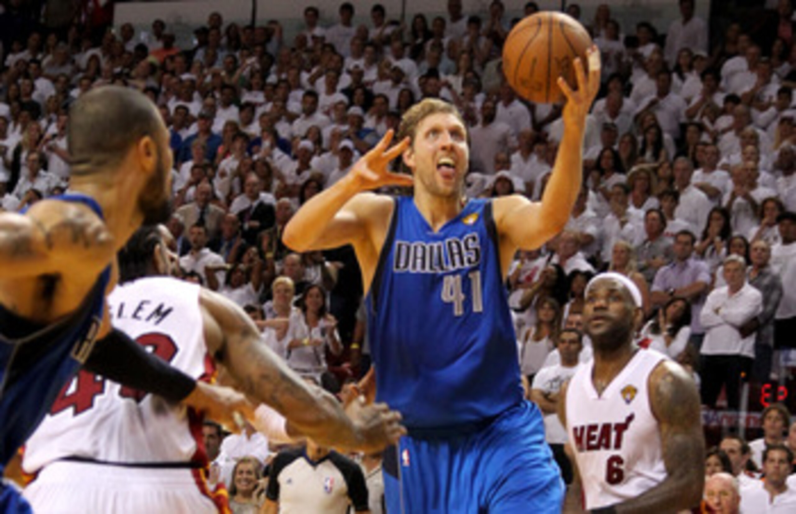 MIAMI, FL - JUNE 02:  Dirk Nowitzki #41 of the Dallas Mavericks makes the game-winning shot to put the Mavericks up 95-93 with 3.6 seconds left in the game against Udonis Haslem #40 of the Miami Heat in Game Two of the 2011 NBA Finals at American Airlines