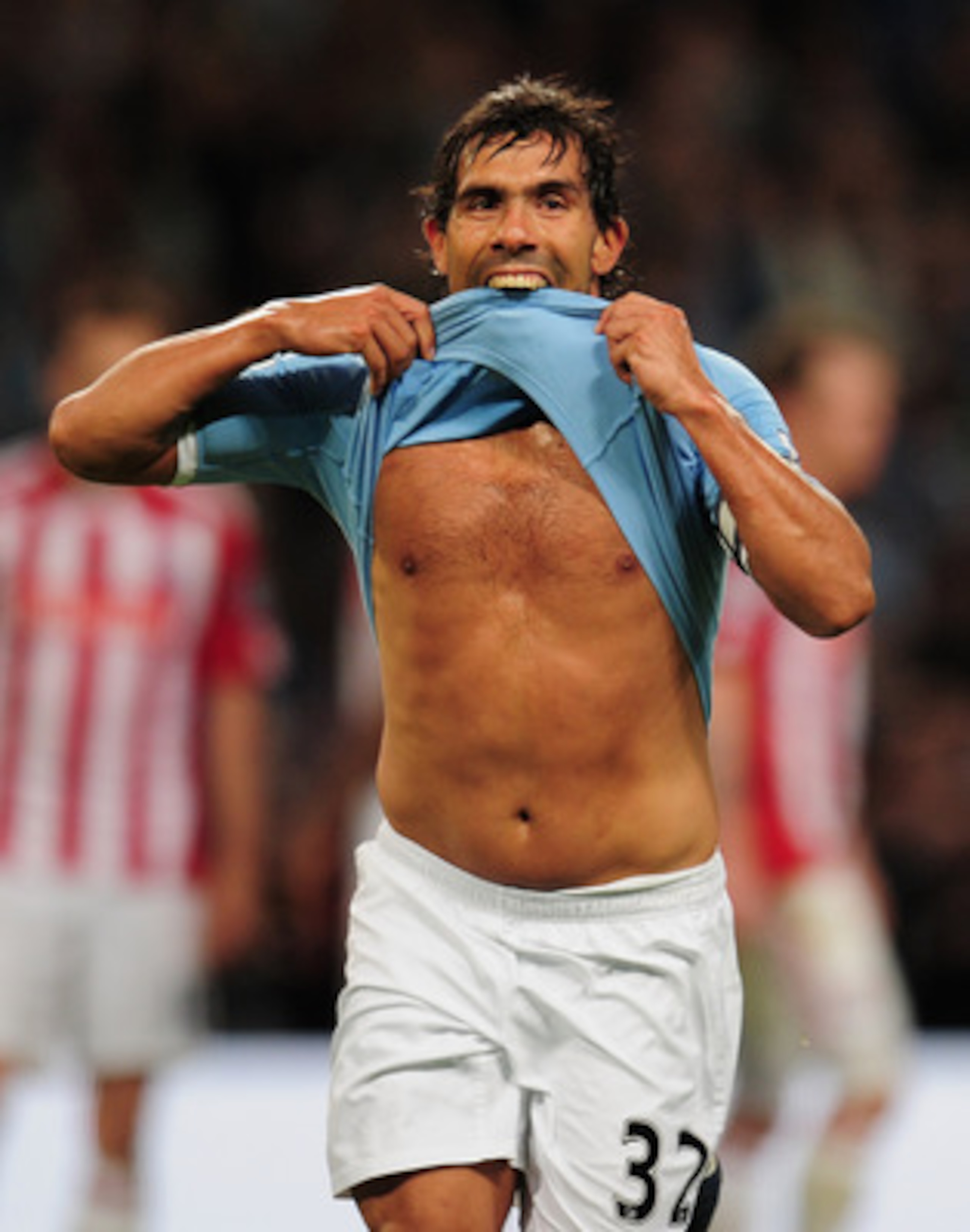 MANCHESTER, ENGLAND - MAY 17:  Carlos Tevez of Manchester City celebrates after scoring his second goal during the Barclays Premier League match between Manchester City and Stoke City at City of Manchester Stadium on May 17, 2011 in Manchester, England.  