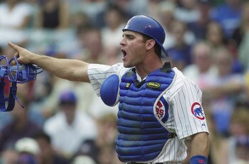 CHICAGO - AUGUST 28:  Catcher Todd Hundley #9 of the Chicago Cubs calls out to his team against the Milwaukee Brewers on August 28, 2001 at Wrigley Field in Chicago, Illinois.  The Brewers defeated the Cubs 8-1.  (Photo by Jonathan Daniel/Getty Images)