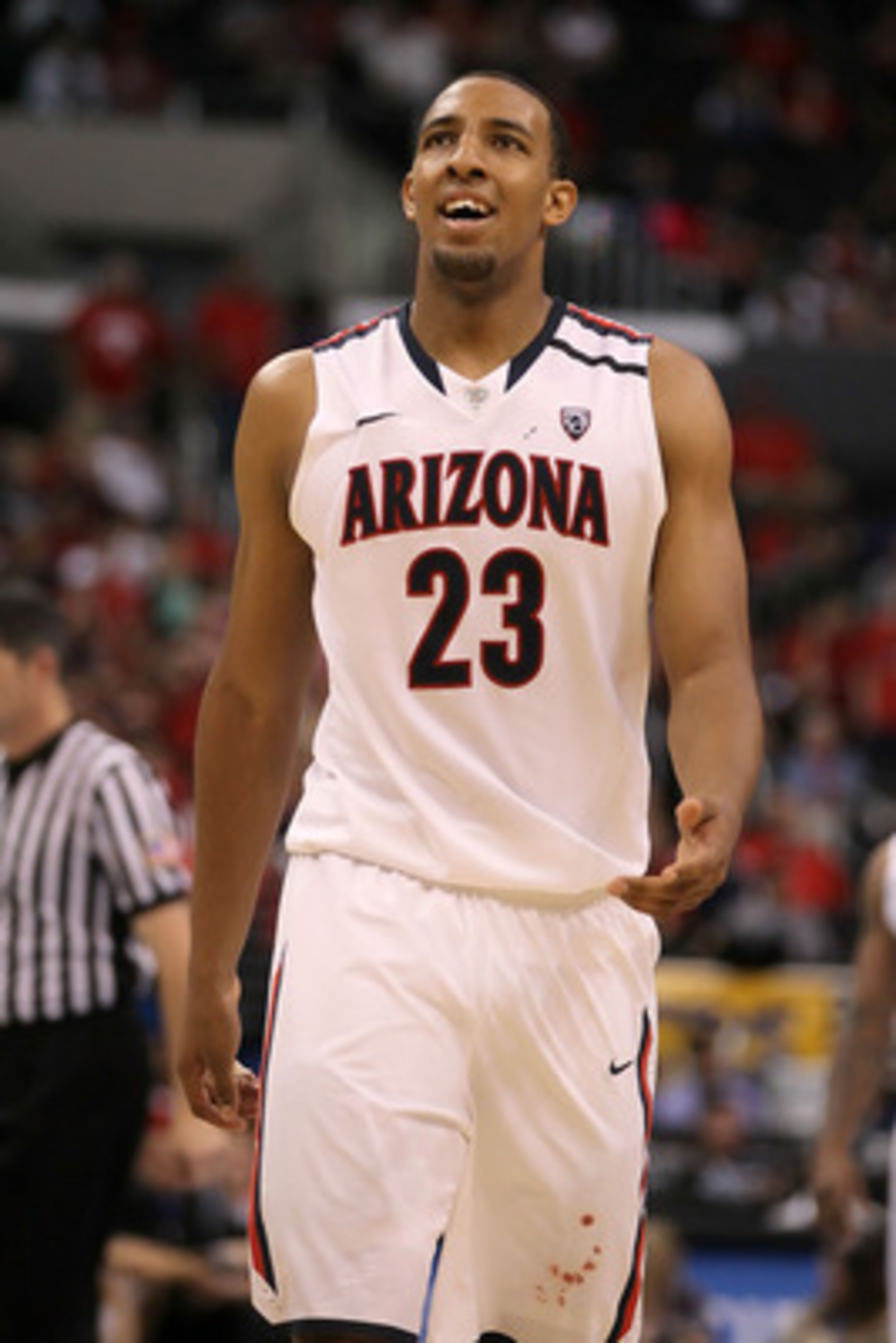 LOS ANGELES, CA - MARCH 12: Derrick Williams #23 of the Arizona Wildcats reacts in the second half while taking on the Washington Huskies in the championship game of the 2011 Pacific Life Pac-10 Men's Basketball Tournament at Staples Center on March 12, LOS ANGELES, CA - MARCH 12: Derrick Williams #23 of the Arizona Wildcats reacts in the second half while taking on the Washington Huskies in the championship game of the 2011 Pacific Life Pac-10 Men's Basketball Tournament at Staples Center on March 12,