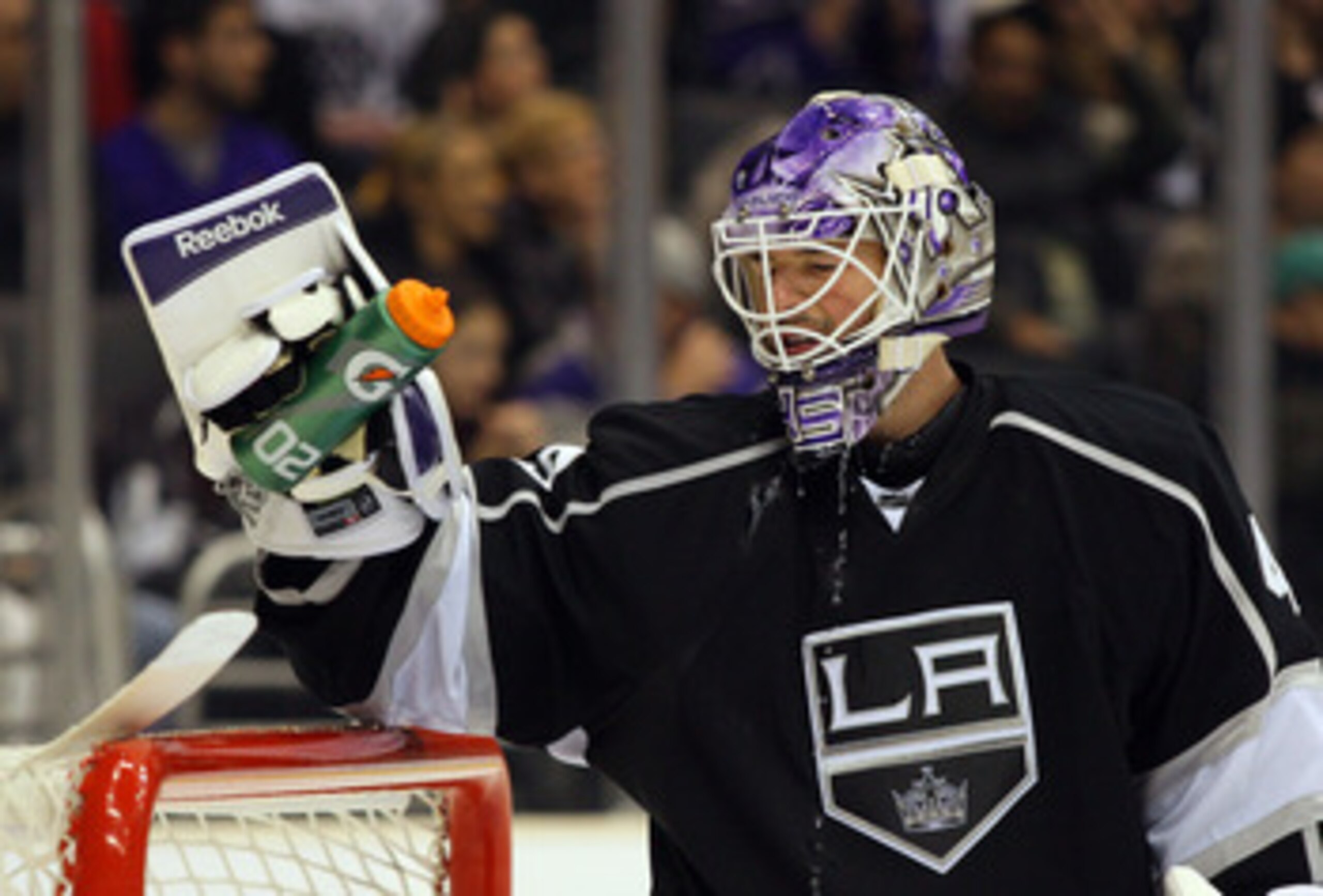 LOS ANGELES, CA - MARCH 03:  Goaltender Jonathan Bernier #45 of the Los Angeles Kings takes a water break prior to a faceoff in the NHL game against the Phoenix Coyotes at Staples Center on March 3, 2011 in Los Angeles, California. The Kings defeated the 