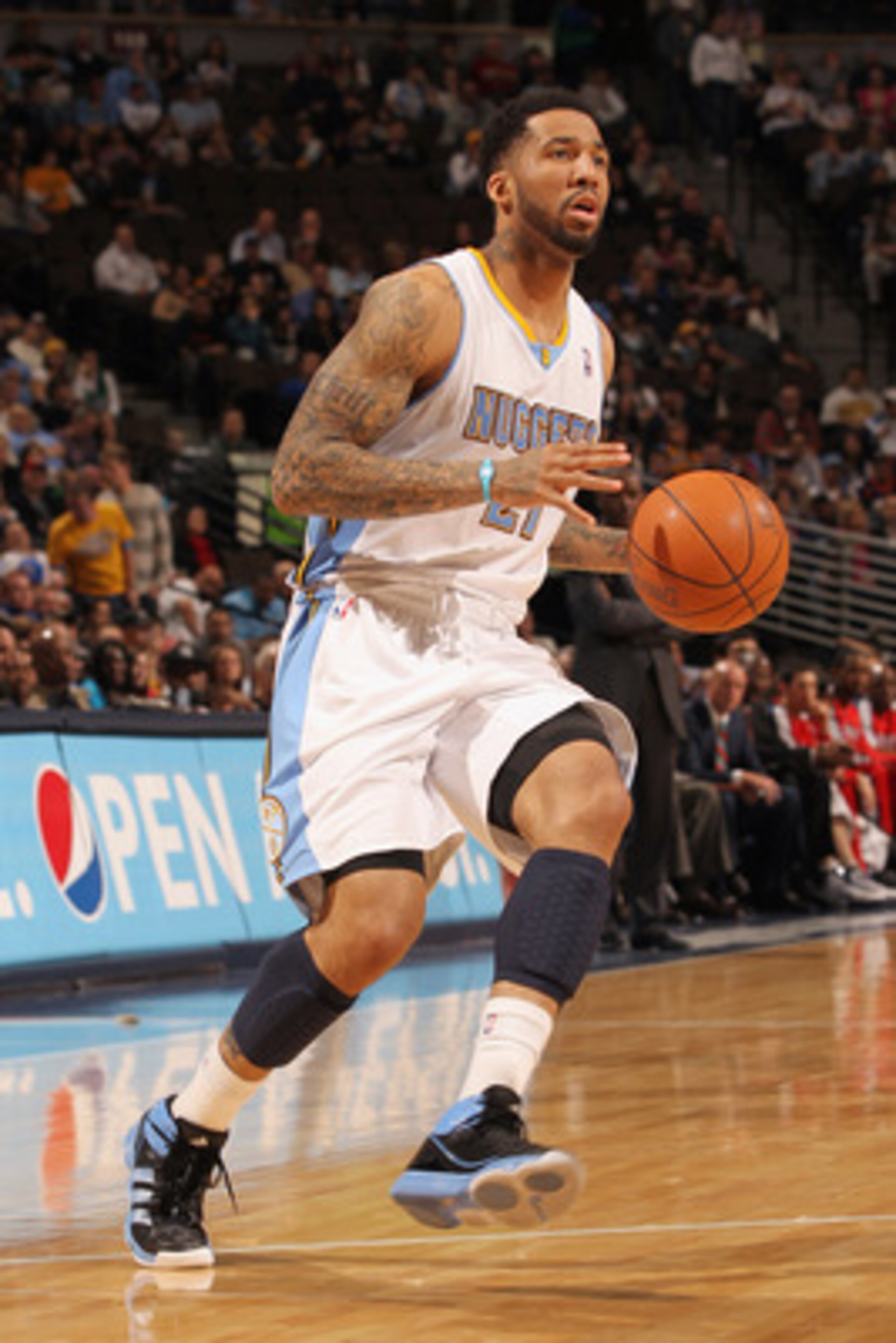 DENVER, CO - FEBRUARY 28:  Wilson Chandler #21 of the Denver Nuggets controls the ball against the Atlanta Hawks during NBA action at the Pepsi Center on February 28, 2011 in Denver, Colorado. The Nuggets deafeated the Hawks 100-90. NOTE TO USER: User exp