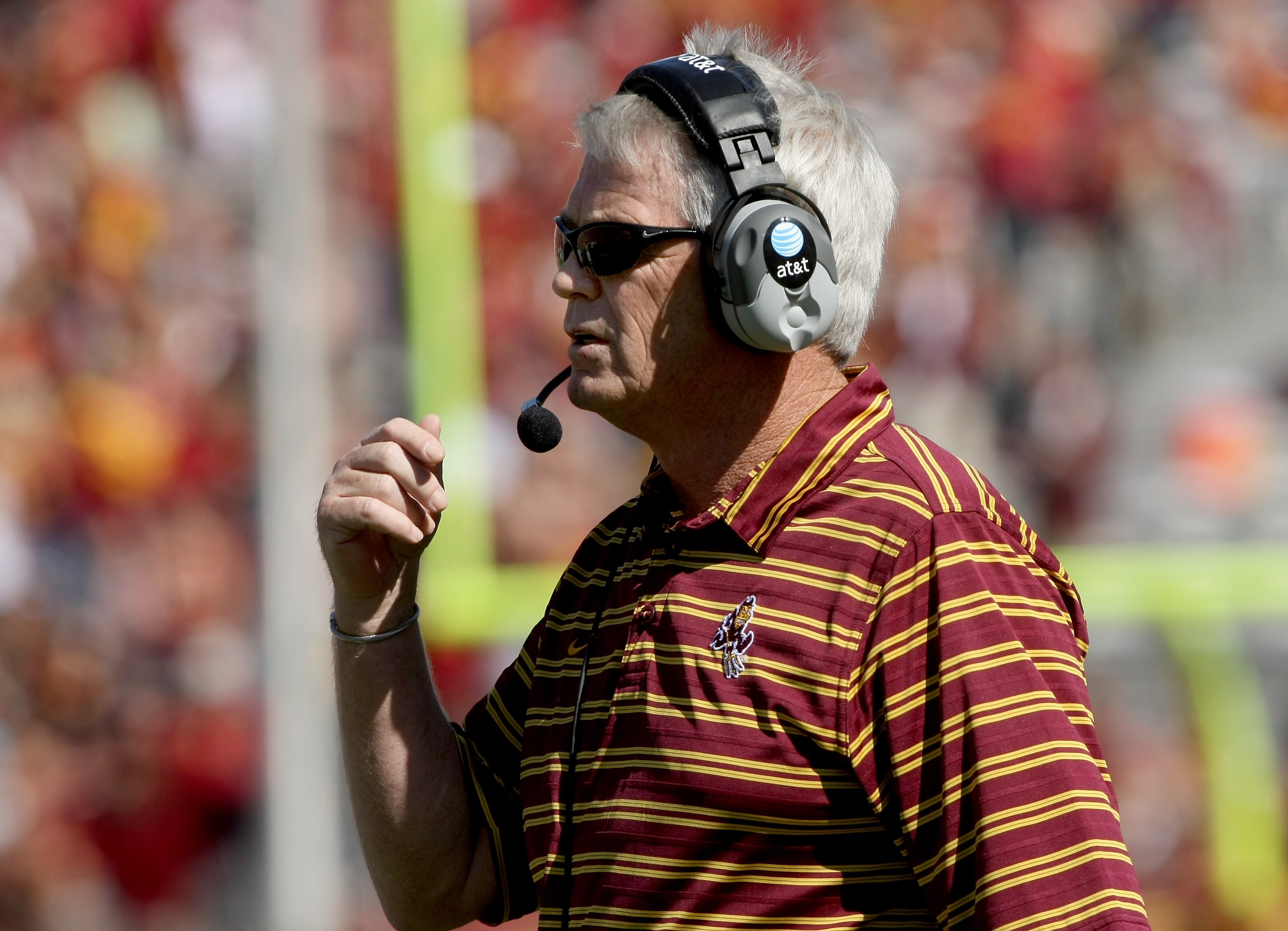 LOS ANGELES, CA - OCTOBER 11: Head coach Dennis Erickson of the Arizona State Sun Devils works on the sidelines during the game against the USC Trojans on October 11, 2008 at the Los Angeles Coliseum in Los Angeles, California.  USC won 28-0.  (Photo by S
