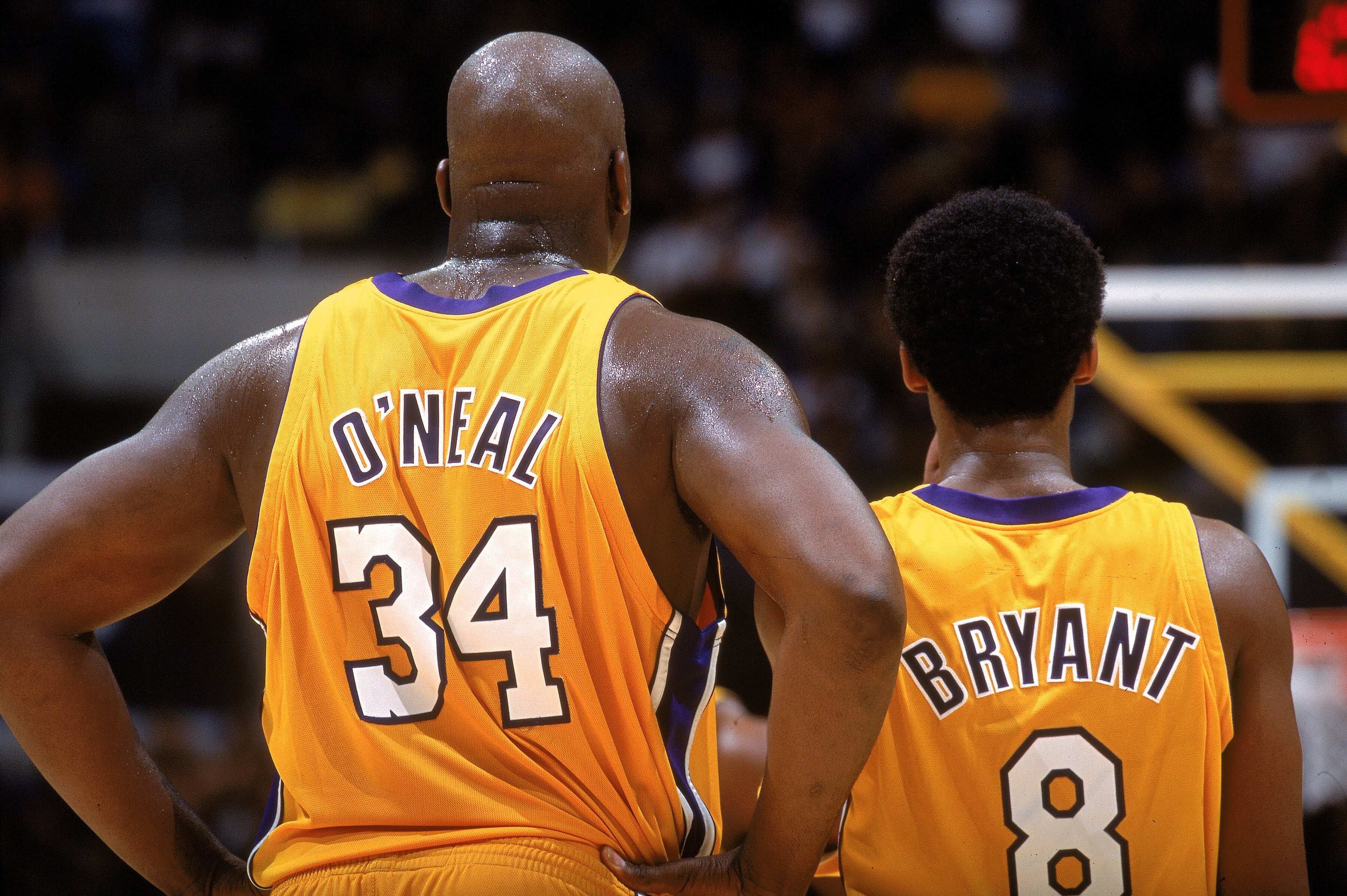 27 Jan 2001:  Kobe Bryant #8 of the Los Angeles Lakers shares a moment with teammate Shaquille O''Neal #34 during the game against the New Jersey Nets at the STAPLES Center in Los Angeles, California.  The Lakers defeated the Nets 113-101.  NOTE TO USER: