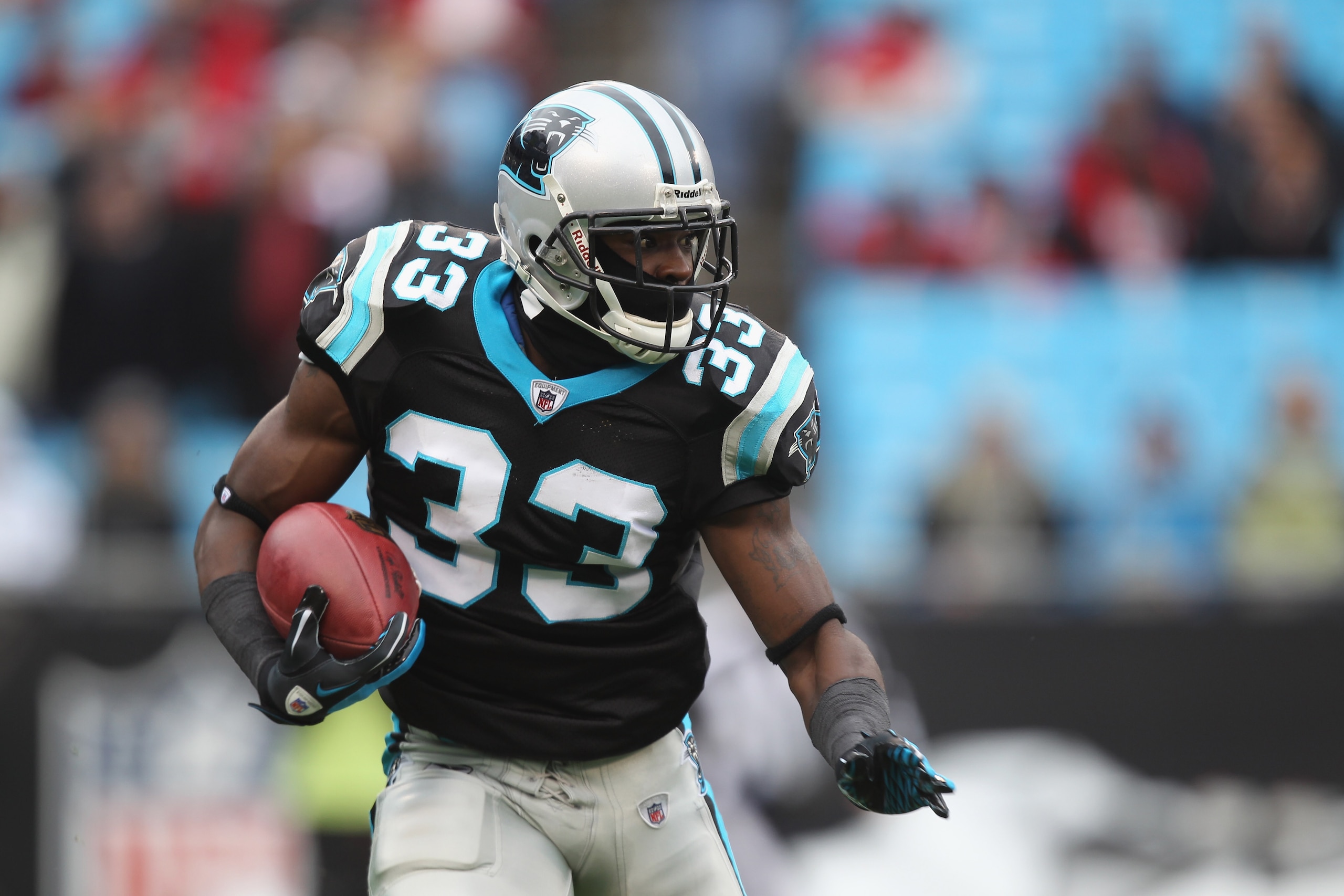 CHARLOTTE, NC - DECEMBER 12:  Mike Goodson #33 of the Carolina Panthers during their game against the Atlanta Falcons at Bank of America Stadium on December 12, 2010 in Charlotte, North Carolina.  (Photo by Streeter Lecka/Getty Images)