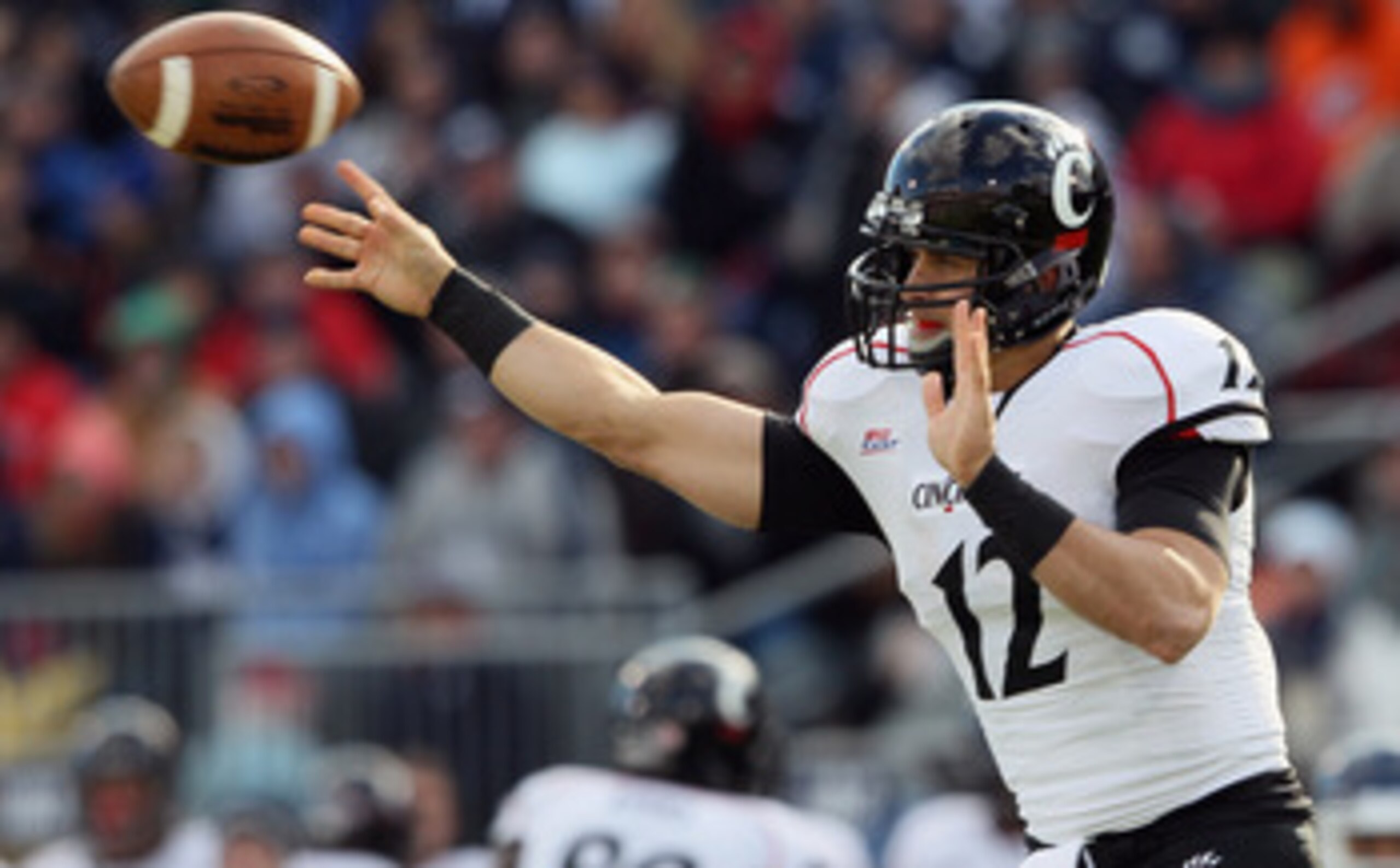 EAST HARTFORD, CT - NOVEMBER 27: Zach Collaros #12 of the Cincinnati Bearcats passes the ball i n the first half against the Connecticut Huskies on November 27, 2010 at Rentschler Field in East Hartford, Connecticut. (Photo by Elsa/Getty Images) EAST HARTFORD, CT - NOVEMBER 27: Zach Collaros #12 of the Cincinnati Bearcats passes the ball i n the first half against the Connecticut Huskies on November 27, 2010 at Rentschler Field in East Hartford, Connecticut. (Photo by Elsa/Getty Images)