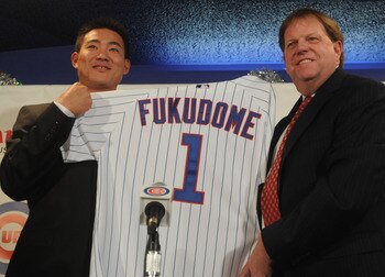 CHICAGO - DECEMBER 19:  Chicago Cubs general manager Jim Hendry (R) introduces Japanese Baseball player Kosuke Fukudome #1 (L) as their new outfielder at Wrigley Field December 19, 2007 in Chicago, Illinois.  (Photo by David Blanks/Getty Images)