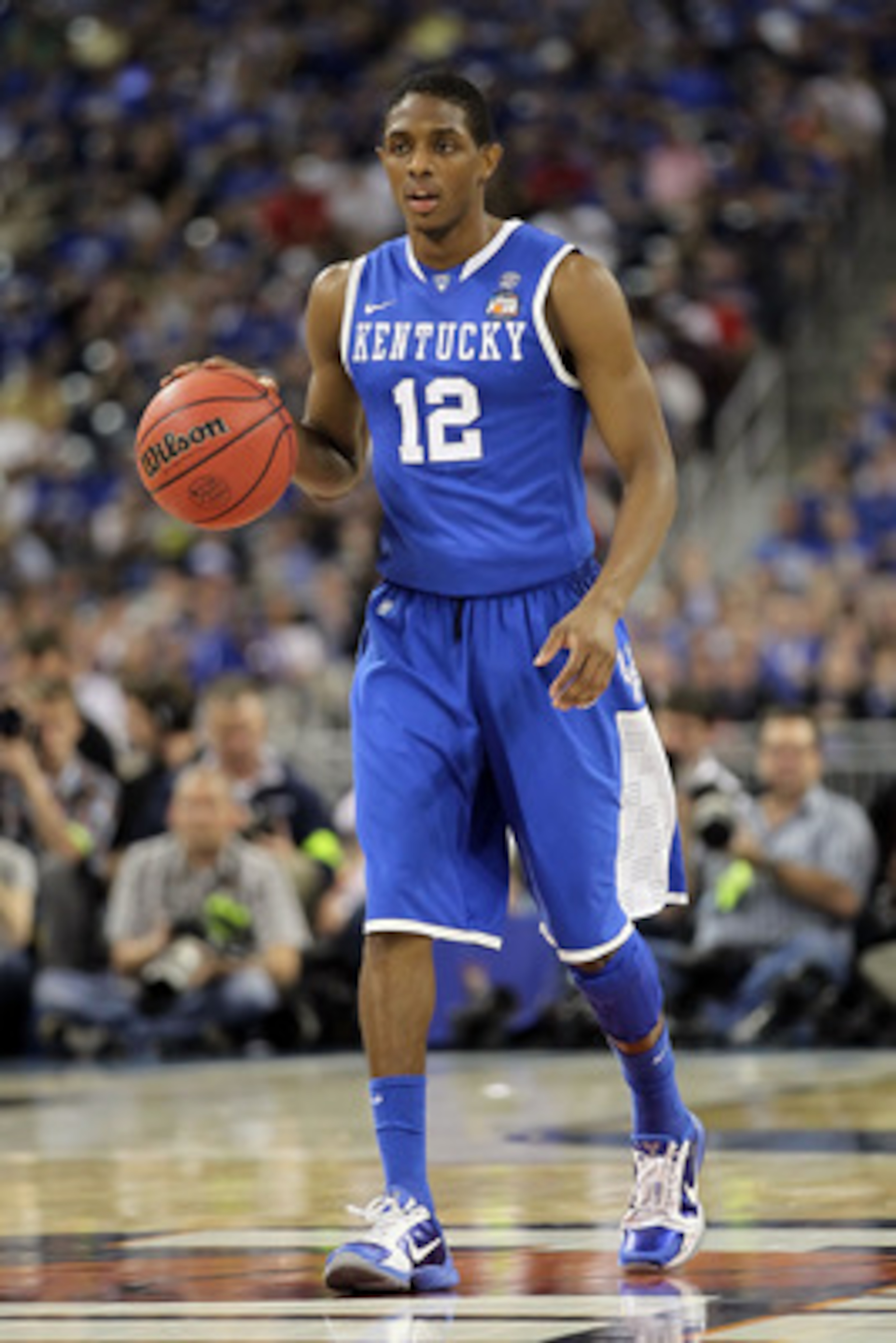 HOUSTON, TX - APRIL 02:  Brandon Knight #12 of the Kentucky Wildcats moves the ball while taking on the Connecticut Huskies during the National Semifinal game of the 2011 NCAA Division I Men's Basketball Championship at Reliant Stadium on April 2, 2011 in