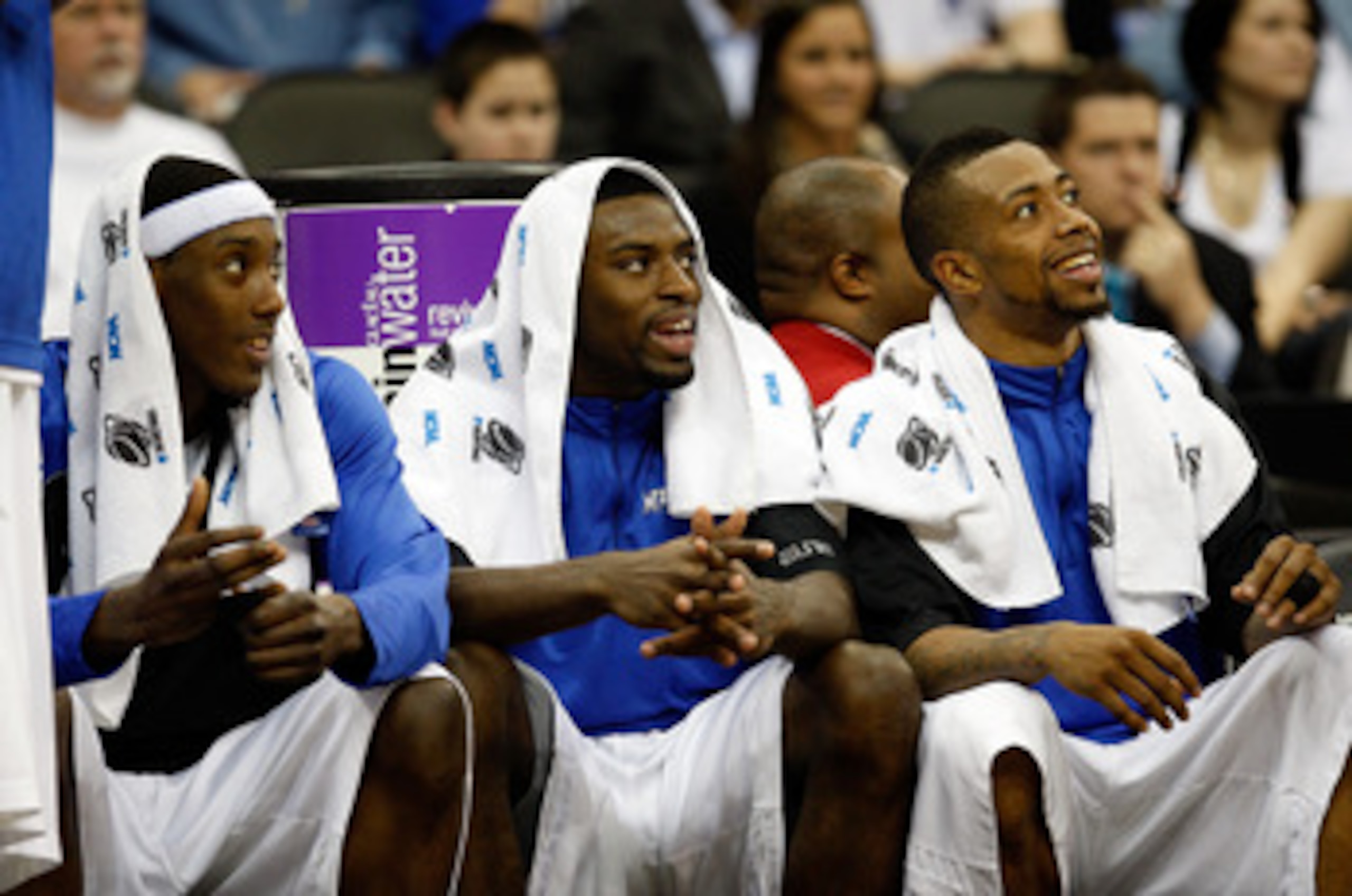 KANSAS CITY, MO - MARCH 21: (L-R) Robert Dozier #2, Tyreke Evans #12 and Antonio Anderson #5 of the Memphis Tigers smile from the bench area late in the second half en route to defeating the Maryland Terrapins 89-70 in the second round of the NCAA Divisi KANSAS CITY, MO - MARCH 21: (L-R) Robert Dozier #2, Tyreke Evans #12 and Antonio Anderson #5 of the Memphis Tigers smile from the bench area late in the second half en route to defeating the Maryland Terrapins 89-70 in the second round of the NCAA Divisi