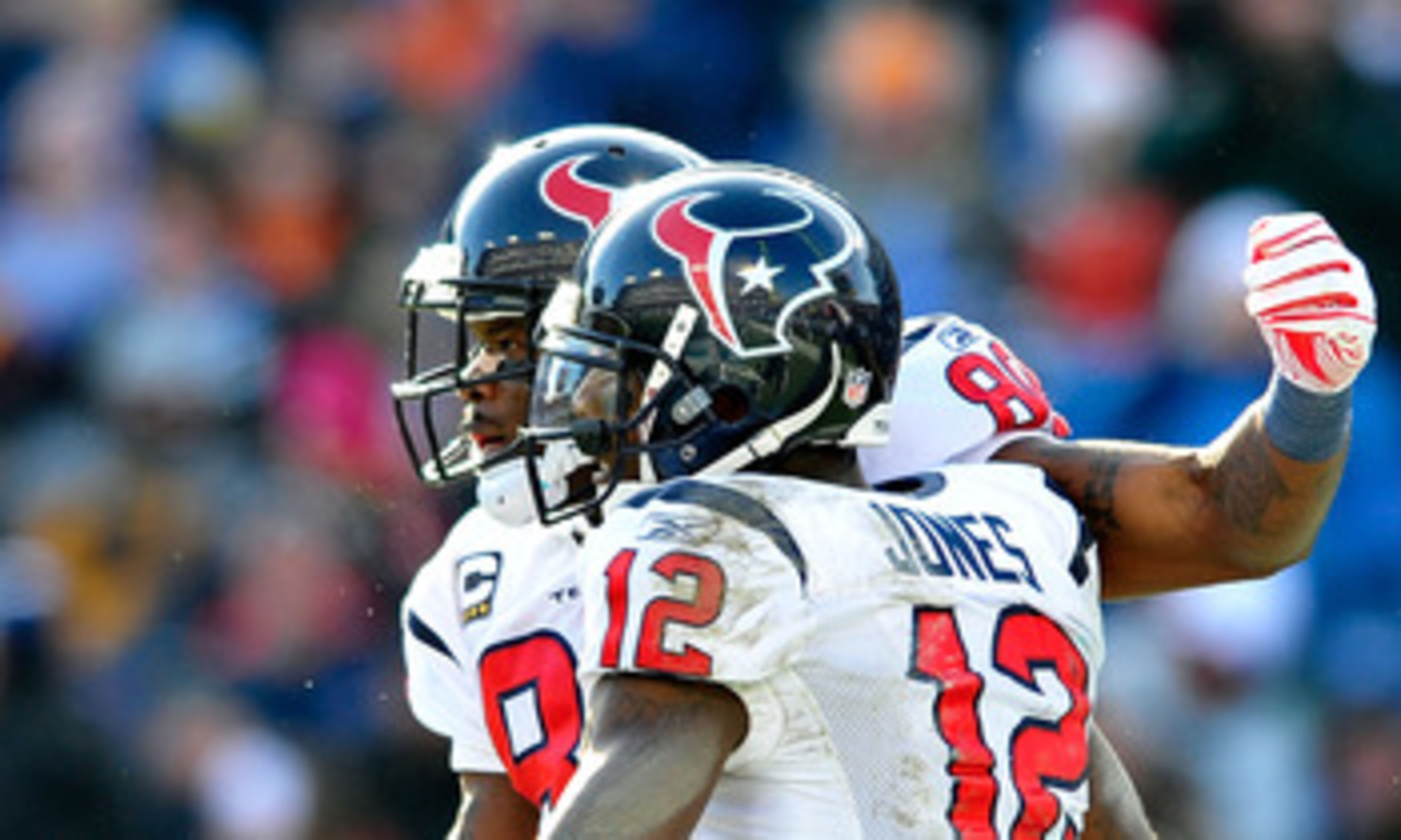 NASHVILLE, TN - DECEMBER 19:  Andre Johnson #80 and Jacoby Jones #12 of the Houston Texans celebrate after Johnson's touchdown against the Tennessee Titans at LP Field on December 19, 2010 in Nashville, Tennessee. The Titans defeated the Texans, 31-17.  (