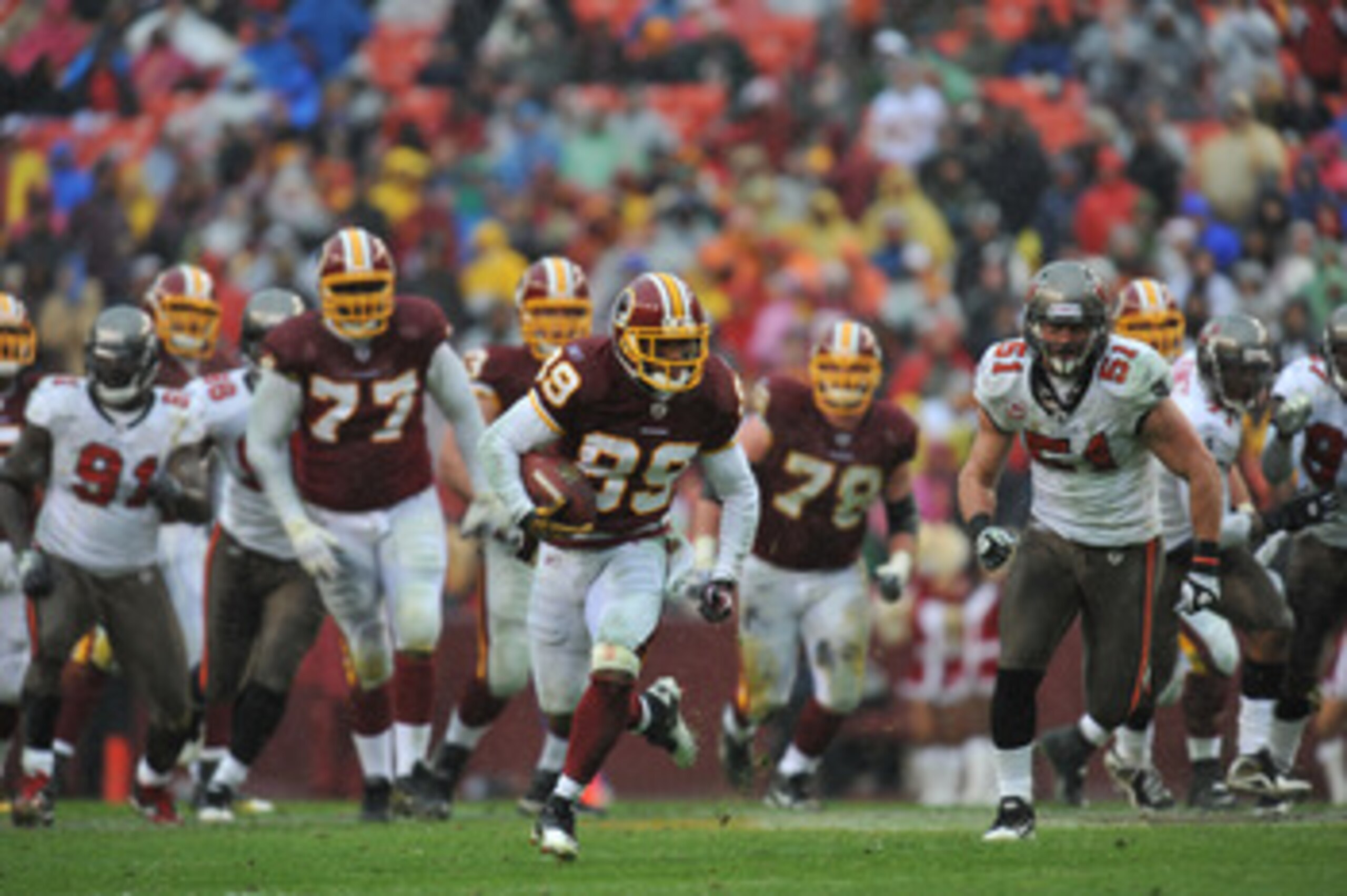 LANDOVER, MD - DECEMBER 12:  Santana Moss #89 of the Washington Redskins runs the ball after a catch during the game against the Tampa Bay Buccaneers  at FedExField on December 12, 2010 in Landover, Maryland. The Buccaneers defeated the Redskins 17-16. (P