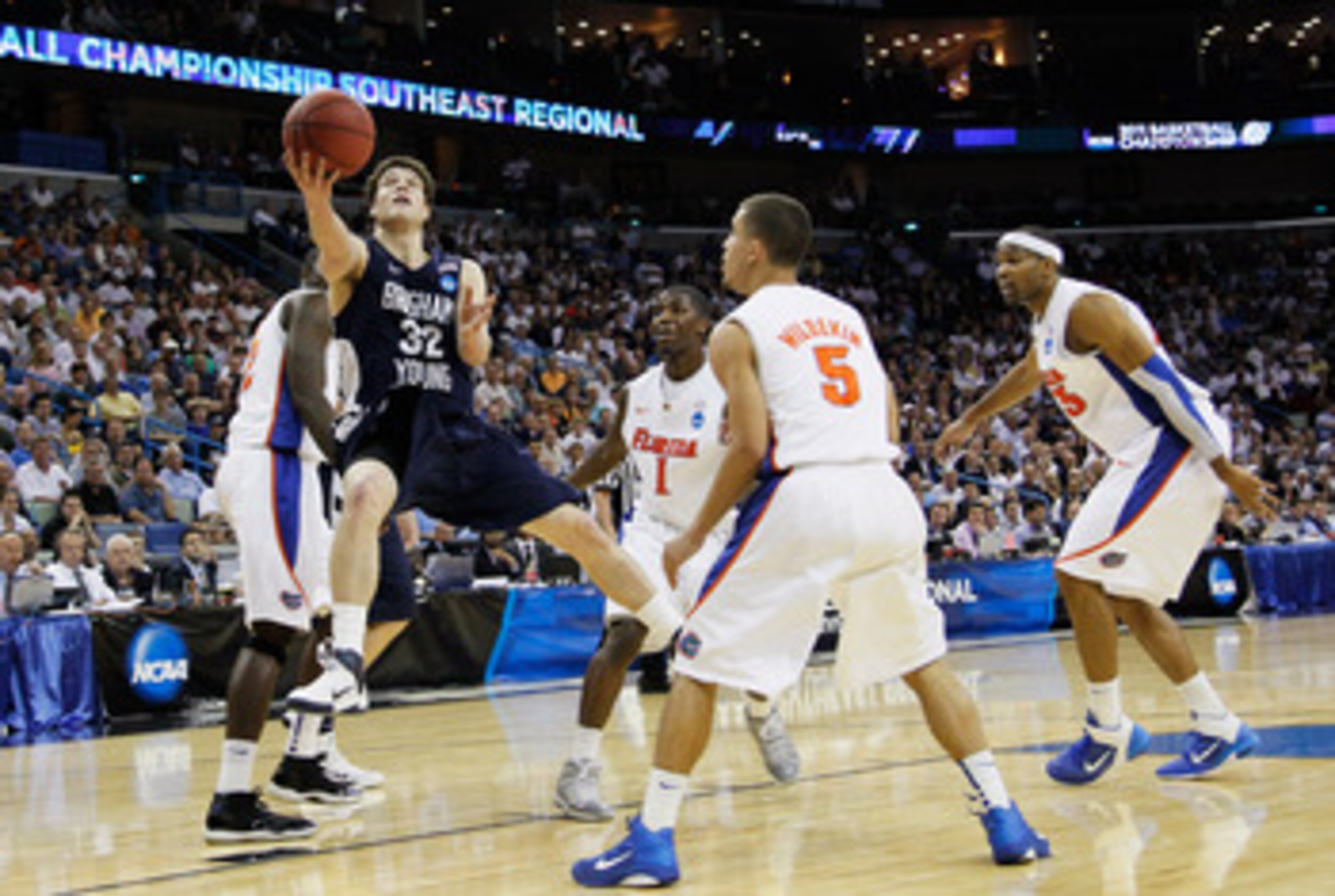NEW ORLEANS, LA - MARCH 24:  Jimmer Fredette #32 of the Brigham Young Cougars shoots against the Florida Gators during the Southeast regional of the 2011 NCAA men's basketball tournament at New Orleans Arena on March 24, 2011 in New Orleans, Louisiana.  (