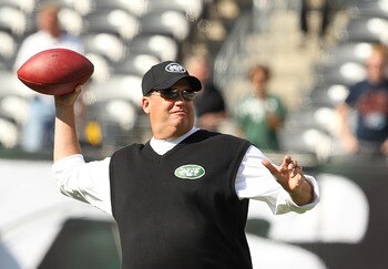 EAST RUTHERFORD, NJ - SEPTEMBER 19:  Rex Ryan, Head Coach of the New York Jets throws passes before the game against the New England Patriots on September 19, 2010 at the New Meadowlands Stadium  in East Rutherford, New Jersey.  (Photo by Al Bello/Getty I