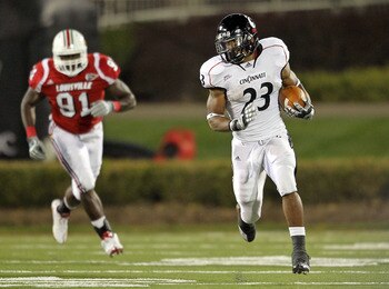 LOUISVILLE, KY - OCTOBER 15:  Isaiah Pead #23 of the Cincinnati Bearcats runs with the ball during the Big East Conference game against the Louisville Cardinals at Papa John's Cardinal Stadium on October 15, 2010 in Louisville, Kentucky.  (Photo by Andy L