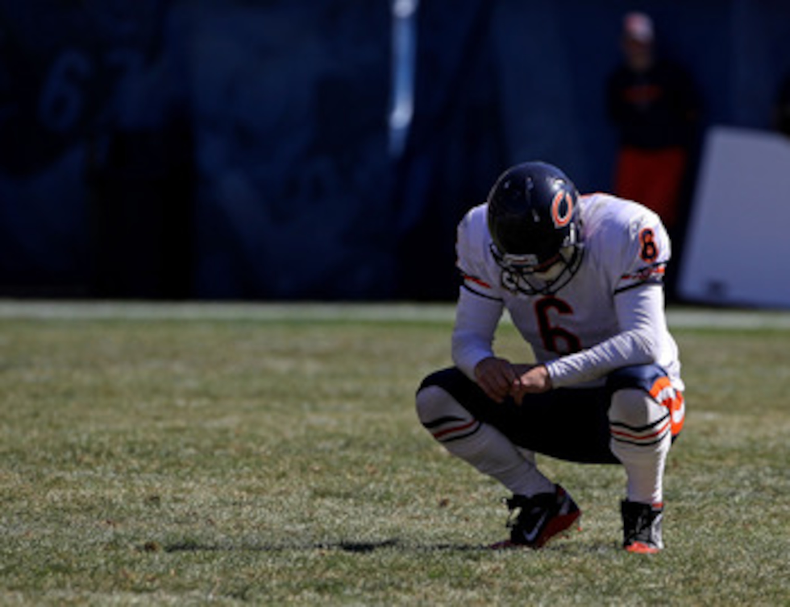 CHICAGO - SEPTEMBER 12: Jay Cutler #6 of the Chicago Bears rests during a time-out against the Detroit Lions during the NFL season opening game at Soldier Field on September 12, 2010 in Chicago, Illinois. The Bears defeated the Lions 19-14. (Photo by Jona