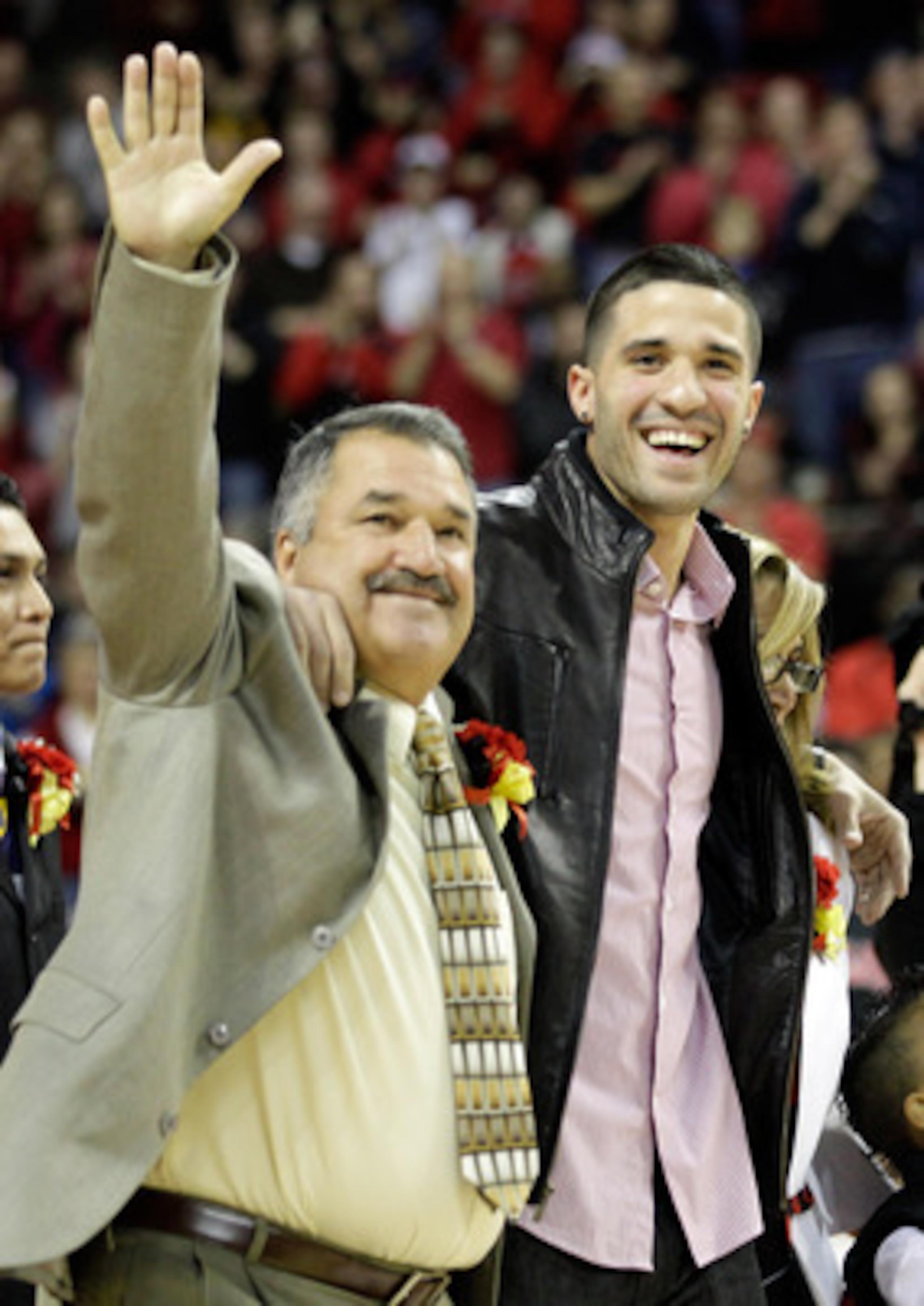 COLLEGE PARK, MD - FEBRUARY 20: Former Maryland Terrapins player and a current member of the Memphis Grizzlies, Greivis Vasquez, right, and his father Gregorio, left, before the start of the Terrapins game against the NC State Wolfpack at the Comcast Cent