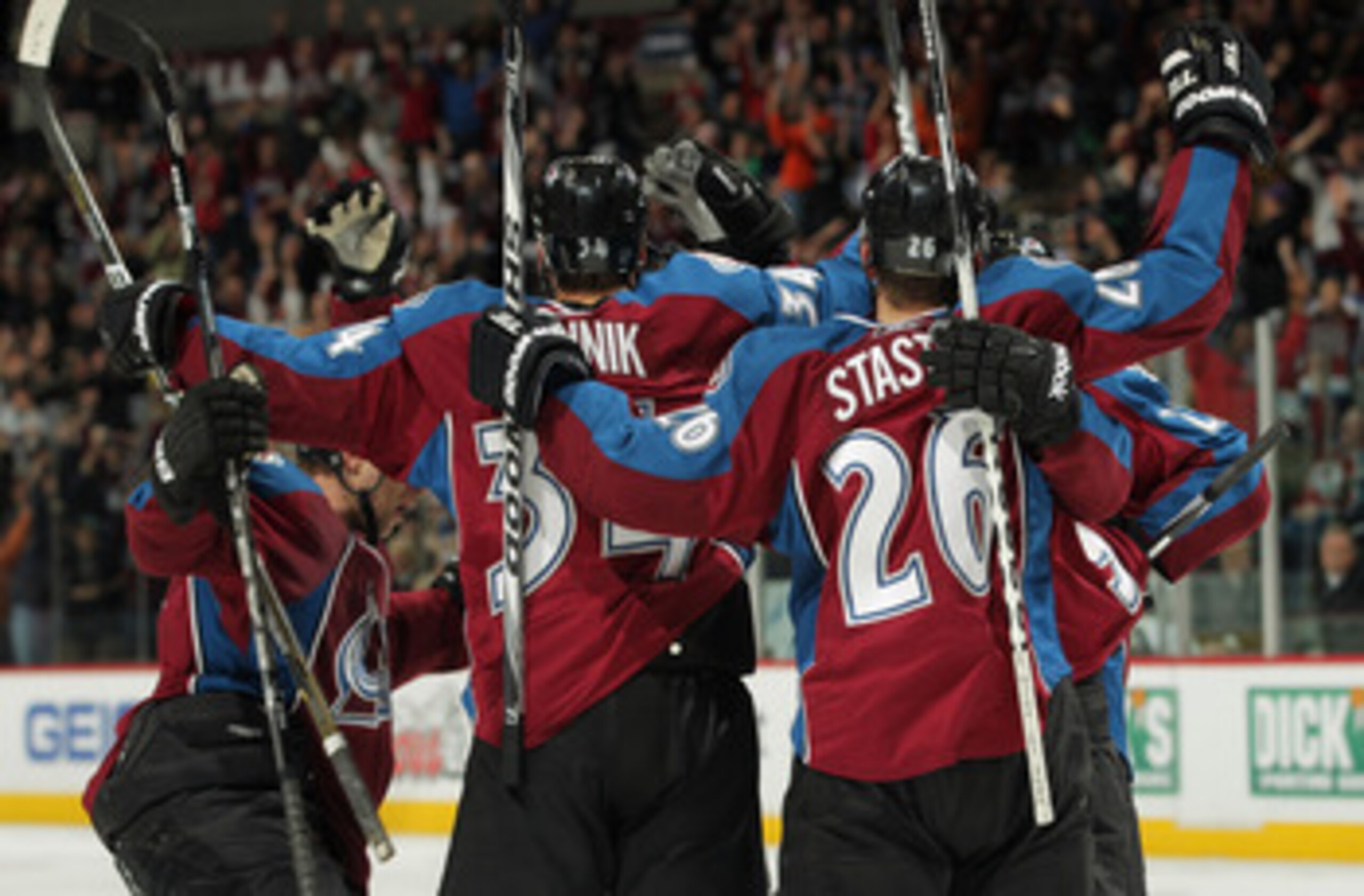 DENVER, CO - MARCH 22:  The Colorado Avalanche celebrate a goal by Daniel Winnik #34 to tie the score 4-4 with three seconds remaining in the game against the Columbus Blue Jackets at the Pepsi Center on March 22, 2011 in Denver, Colorado. The Avalanche d