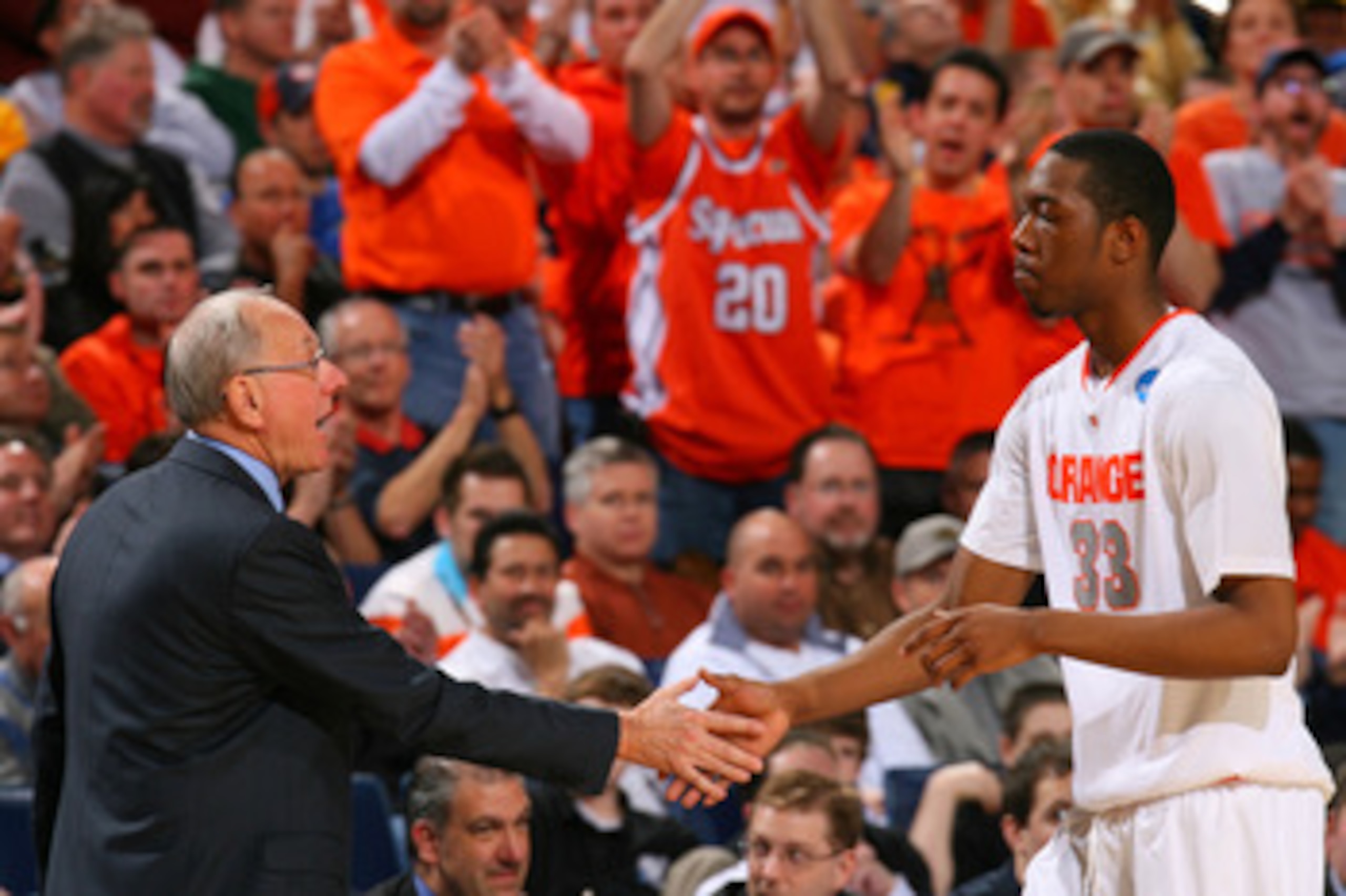 BUFFALO, NY - MARCH 21:  Head coach Jim Boeheim of the Syracuse Orange greets DaShonte Riley #33 as he comes out of the game against the Gonzaga Bulldogs during the second round of the 2010 NCAA men's basketball tournament at HSBC Arena at HSBC Arena on M