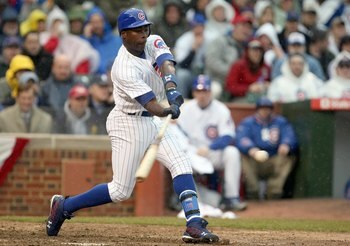 CHICAGO - MARCH 31: Alfonso Soriano #12 of the Chicago Cubs swings at the pitch against the Milwaukee Brewers during the Opening Day game on March 31, 2008 at Wrigley Field in Chicago, Illinois. (Photo by Jonathan Daniel/Getty Images)