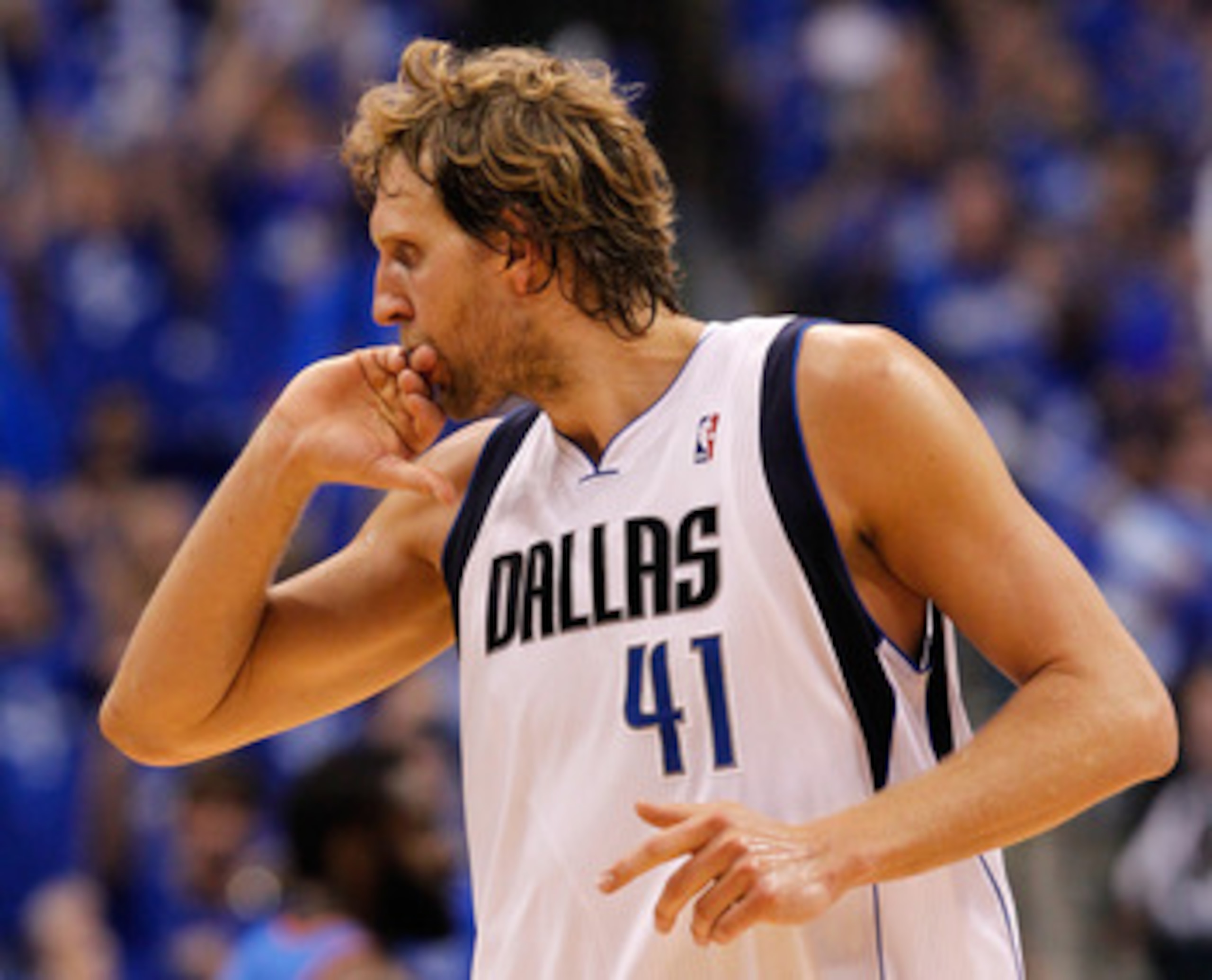 DALLAS, TX - MAY 25:  Dirk Nowitzki #41 of the Dallas Mavericks puts his finger in his mouth as he runs back down court in the second quarter while taking on the Oklahoma City Thunder in Game Five of the Western Conference Finals during the 2011 NBA Playo