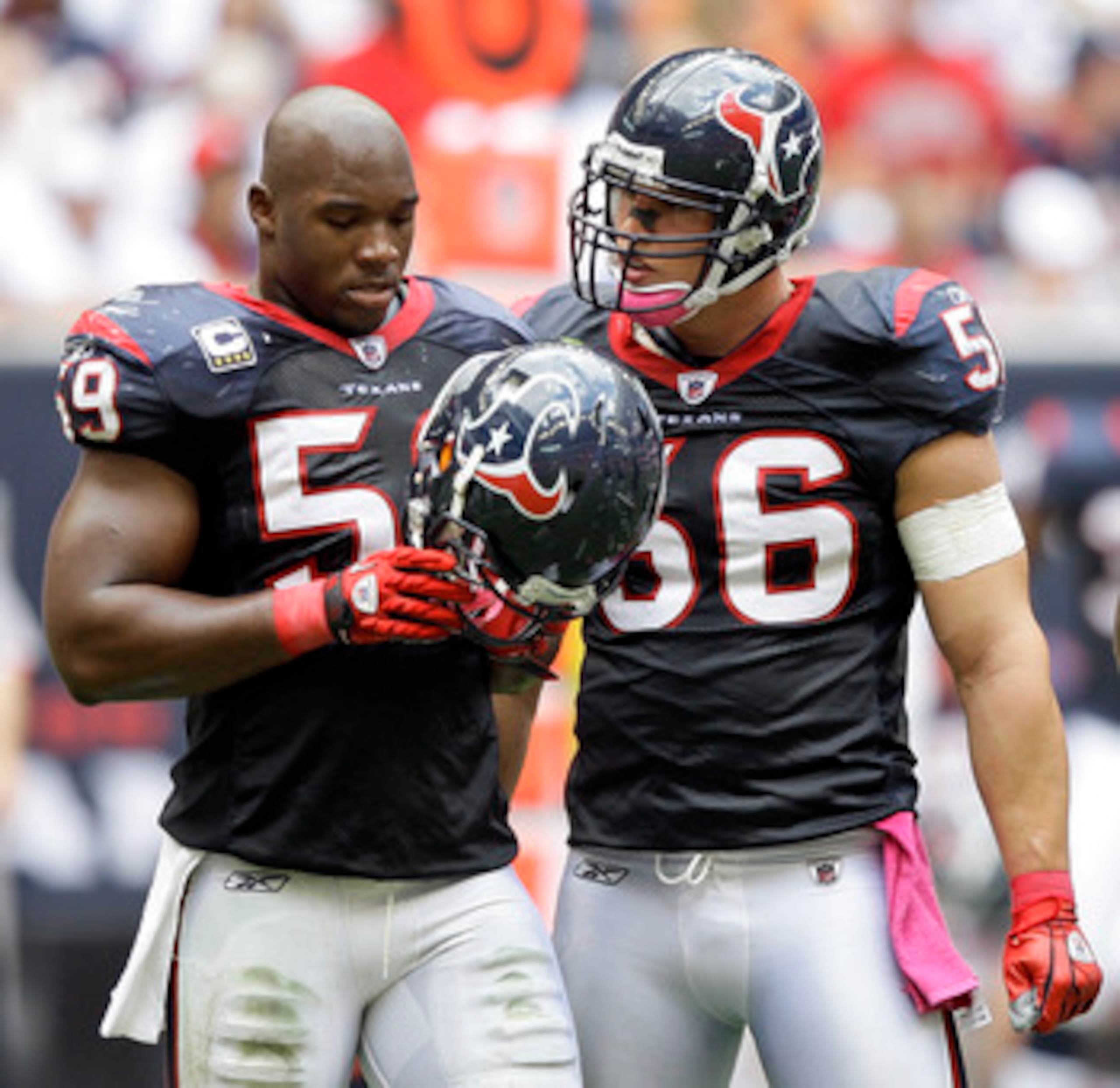 HOUSTON - OCTOBER 17: DeMeco Ryans #59 and Brian Cushing #56 of the Houston Texans talk during a break in the play during a game against the Kansas City Chiefs at Reliant Stadium on October 17, 2010 in Houston, Texas. (Photo by Bob Levey/Getty Images) HOUSTON - OCTOBER 17: DeMeco Ryans #59 and Brian Cushing #56 of the Houston Texans talk during a break in the play during a game against the Kansas City Chiefs at Reliant Stadium on October 17, 2010 in Houston, Texas. (Photo by Bob Levey/Getty Images)