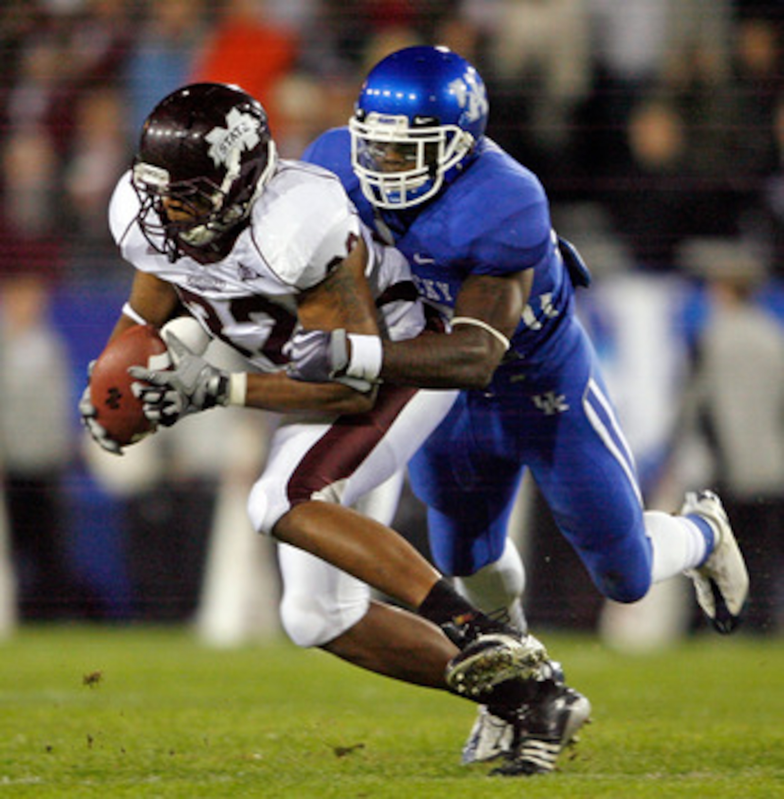 LEXINGTON, KY - OCTOBER 31: Marcus Green #32 of the Mississippi State Bulldogs catches a pass while defended by Danny Trevathan #22 of the Kentucky Wildcats during the SEC game at Commonwealth Stadium on October 31, 2009 in Lexington, Kentucky. (Photo LEXINGTON, KY - OCTOBER 31: Marcus Green #32 of the Mississippi State Bulldogs catches a pass while defended by Danny Trevathan #22 of the Kentucky Wildcats during the SEC game at Commonwealth Stadium on October 31, 2009 in Lexington, Kentucky. (Photo