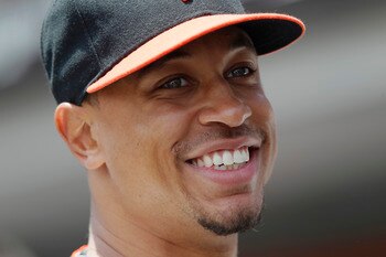 SAN FRANCISCO, CA - MAY 22:  Emmanuel Burriss #2 of the San Francisco Giants smiles before a game against the Oakland A's at AT&T Park on May 22, 2011 in San Francisco, California.  The Giants won 5-4 in 11 innings.  (Photo by Brian Bahr/Getty Images)