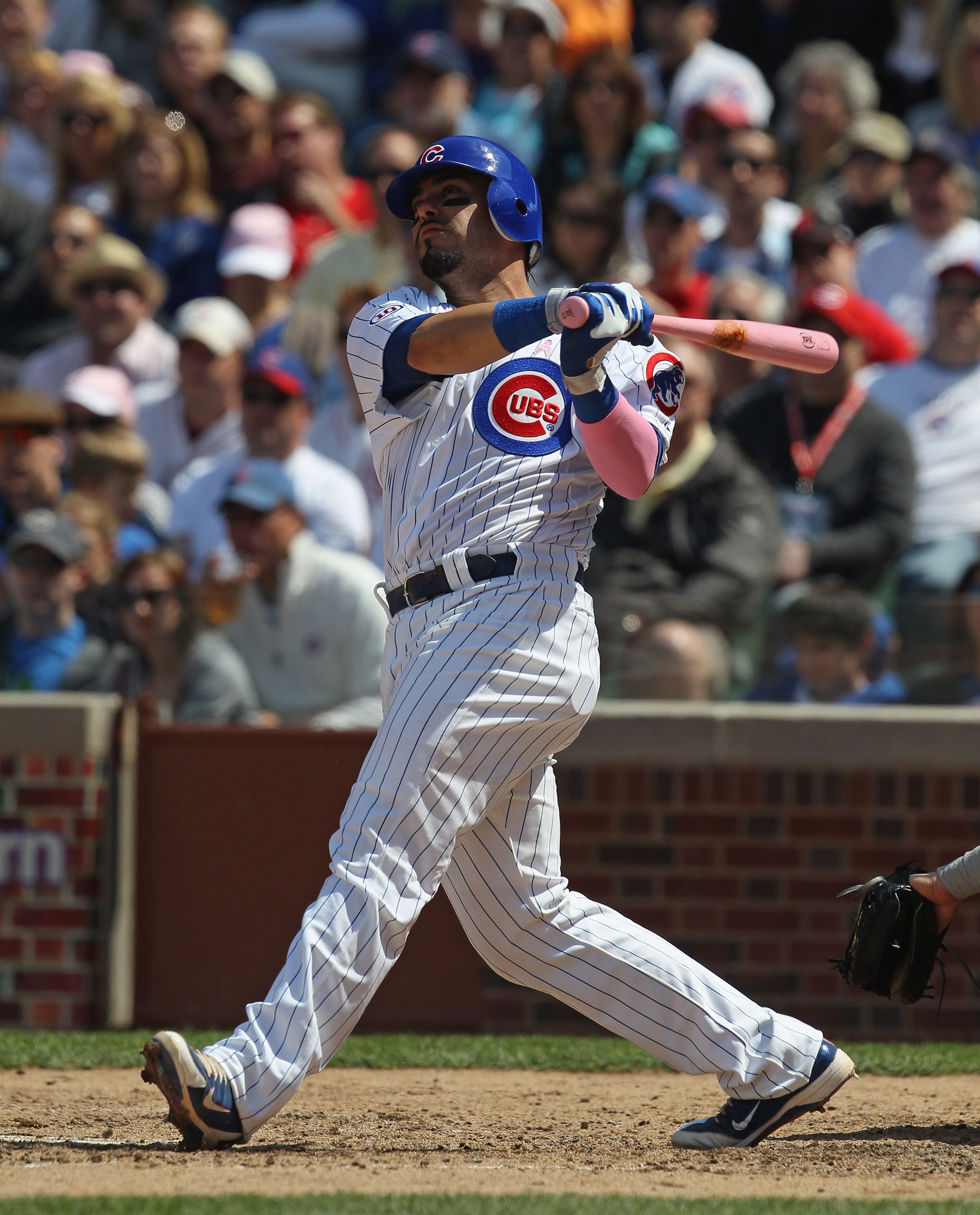 CHICAGO, IL - MAY 08: Geovany Soto #18 of the Chicago Cubs takes a swing against the Cincinnati Reds at Wrigley Field on May 8, 2011 in Chicago, Illinois. The Reds defeated the Cubs 2-0. (Photo by Jonathan Daniel/Getty Images)