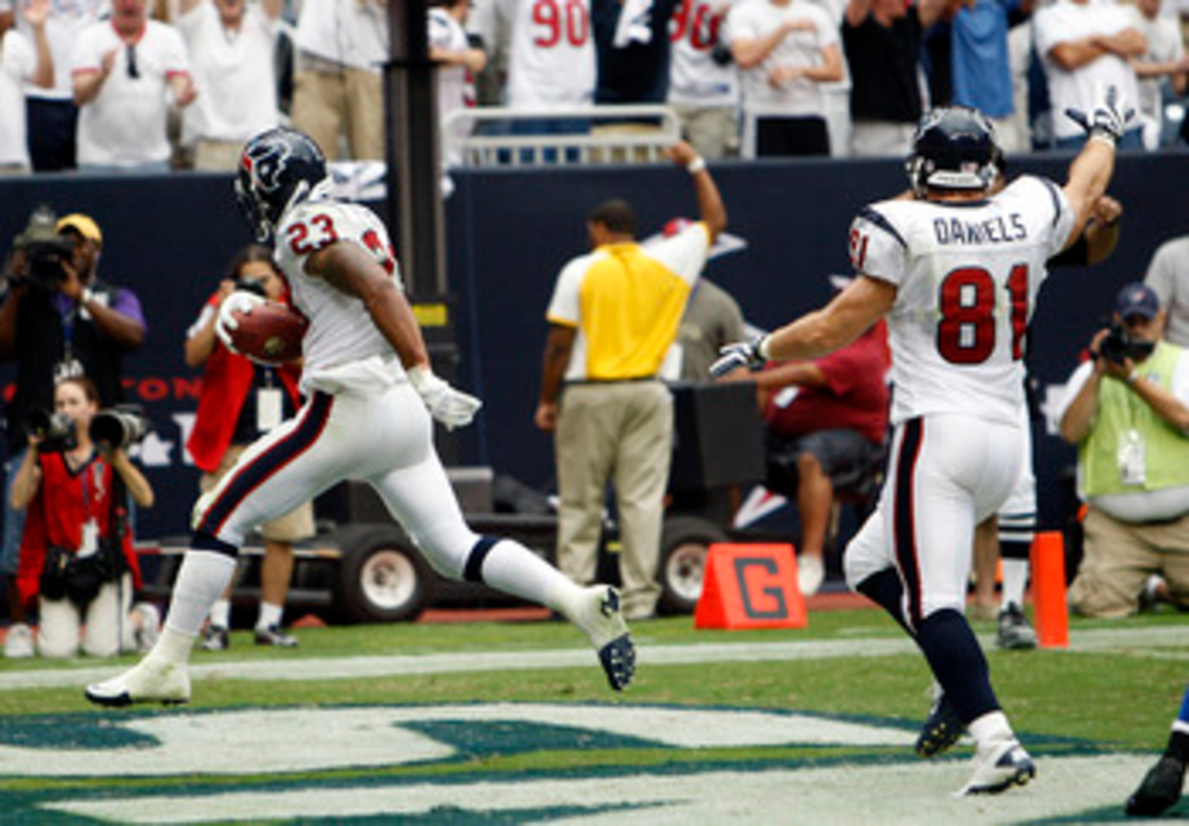 HOUSTON - SEPTEMBER 12:  Running back Arian Foster #23 of the Houston Texans  struts into the endzone for a score in the fourth quarter against the Indianapolis Colts during the NFL season opener at Reliant Stadium on September 12, 2010 in Houston, Texas.