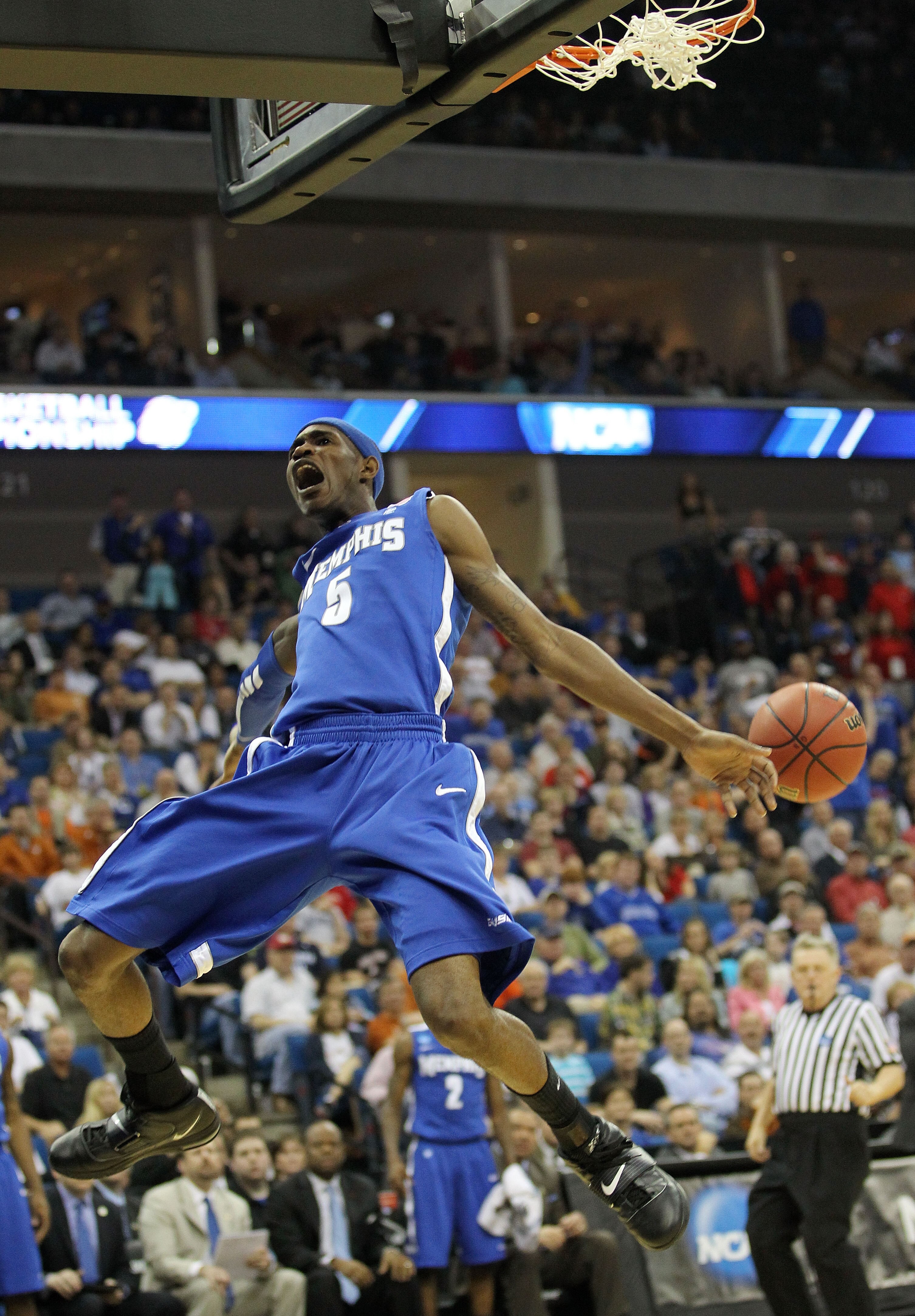 TULSA, OK - MARCH 18:  Will Barton #5 of the Memphis Tigers dunks the ball against the Arizona Wildcats during the second round of the 2011 NCAA men's basketball tournament at BOK Center on March 18, 2011 in Tulsa, Oklahoma.  (Photo by Ronald Martinez/Get