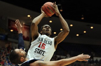 TUCSON, AZ - MARCH 17:  Kawhi Leonard #15 of the San Diego State Aztecs shoots over Taylor Montgomery #44 of the Northern Colorado Bears during the second round of the 2011 NCAA men's basketball tournament at McKale Center on March 17, 2011 in Tucson, Ari