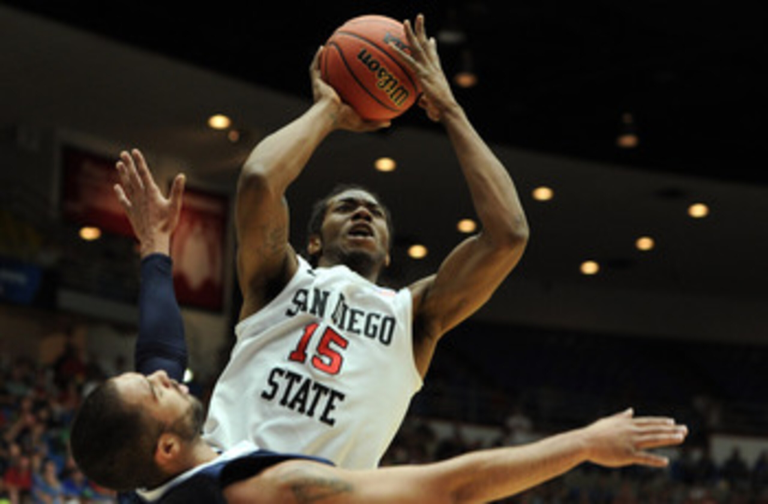 TUCSON, AZ - MARCH 17: Kawhi Leonard #15 of the San Diego State Aztecs shoots over Taylor Montgomery #44 of the Northern Colorado Bears during the second round of the 2011 NCAA men's basketball tournament at McKale Center on March 17, 2011 in Tucson, Ari TUCSON, AZ - MARCH 17: Kawhi Leonard #15 of the San Diego State Aztecs shoots over Taylor Montgomery #44 of the Northern Colorado Bears during the second round of the 2011 NCAA men's basketball tournament at McKale Center on March 17, 2011 in Tucson, Ari