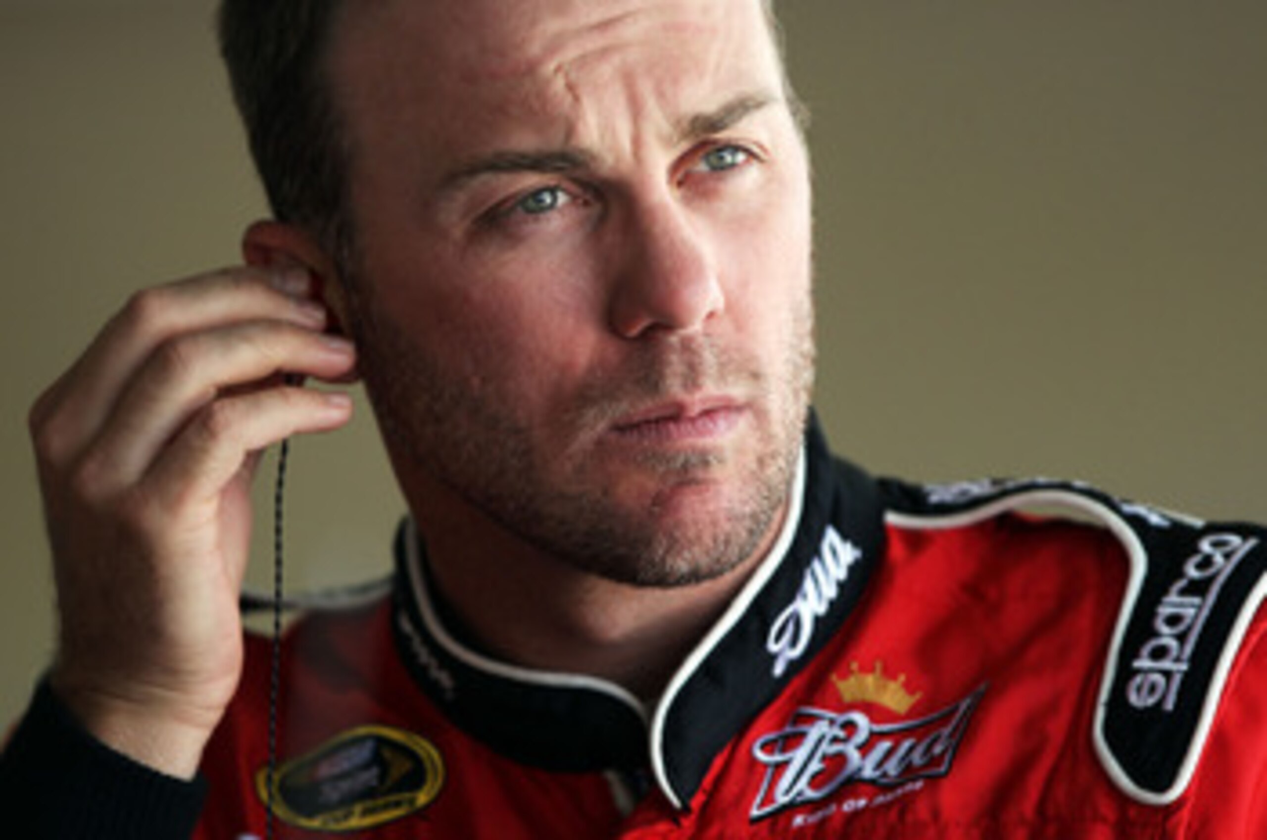 KANSAS CITY, KS - JUNE 03:  Kevin Harvick, driver of the #29 Budweiser Chevrolet, stands in the garage area during practice for the NASCAR Sprint Cup Series STP 400 at Kansas Speedway on June 3, 2011 in Kansas City, Kansas.  (Photo by Jamie Squire/Getty I