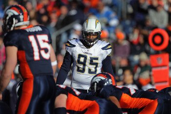 DENVER - JANUARY 02:  Outside linebacker Shaun Phillips #95 of the San Diego Chargers defends against the Denver Broncos at INVESCO Field at Mile High on January 2, 2011 in Denver, Colorado. The Chargers defeated the Broncos 33-28.  (Photo by Doug Pensing