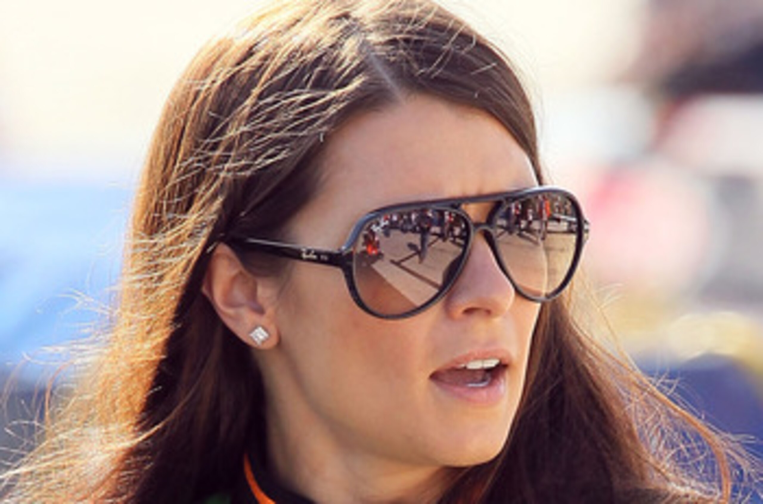 DOVER, DE - SEPTEMBER 25: Danica Patrick, driver of the #7 GoDaddy.com Chevrolet, walks on the grid during qualifying for the NASCAR Nationwide Series Dover 200 at Dover International Speedway on September 25, 2010 in Dover, Delaware. (Photo by Jim McIs DOVER, DE - SEPTEMBER 25: Danica Patrick, driver of the #7 GoDaddy.com Chevrolet, walks on the grid during qualifying for the NASCAR Nationwide Series Dover 200 at Dover International Speedway on September 25, 2010 in Dover, Delaware. (Photo by Jim McIs