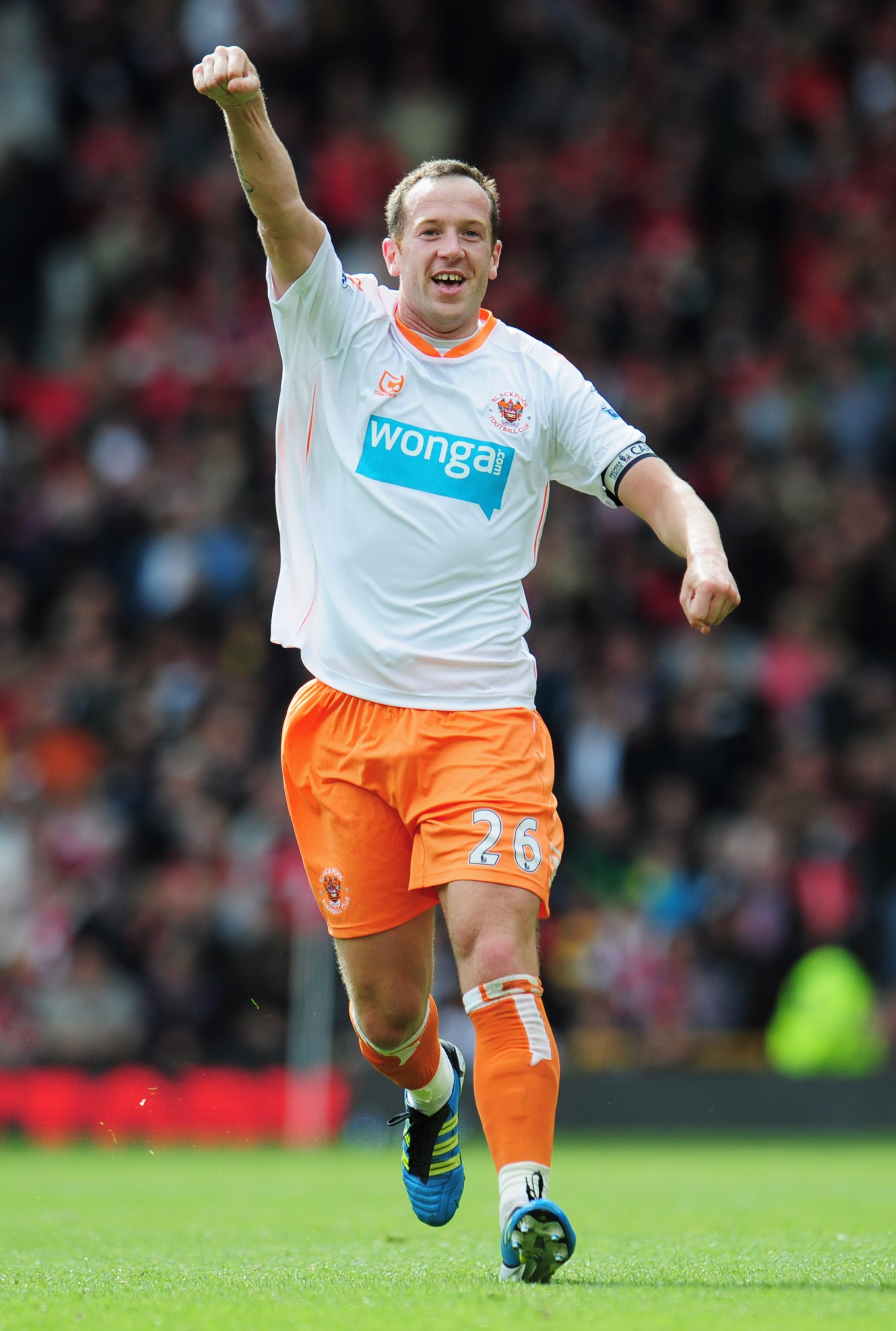 MANCHESTER, ENGLAND - MAY 22:  Charlie Adam of Blackpool celebrates as scores their first goal from a free kick during the Barclays Premier League match between Manchester United and Blackpool at Old Trafford on May 22, 2011 in Manchester, England.  (Phot