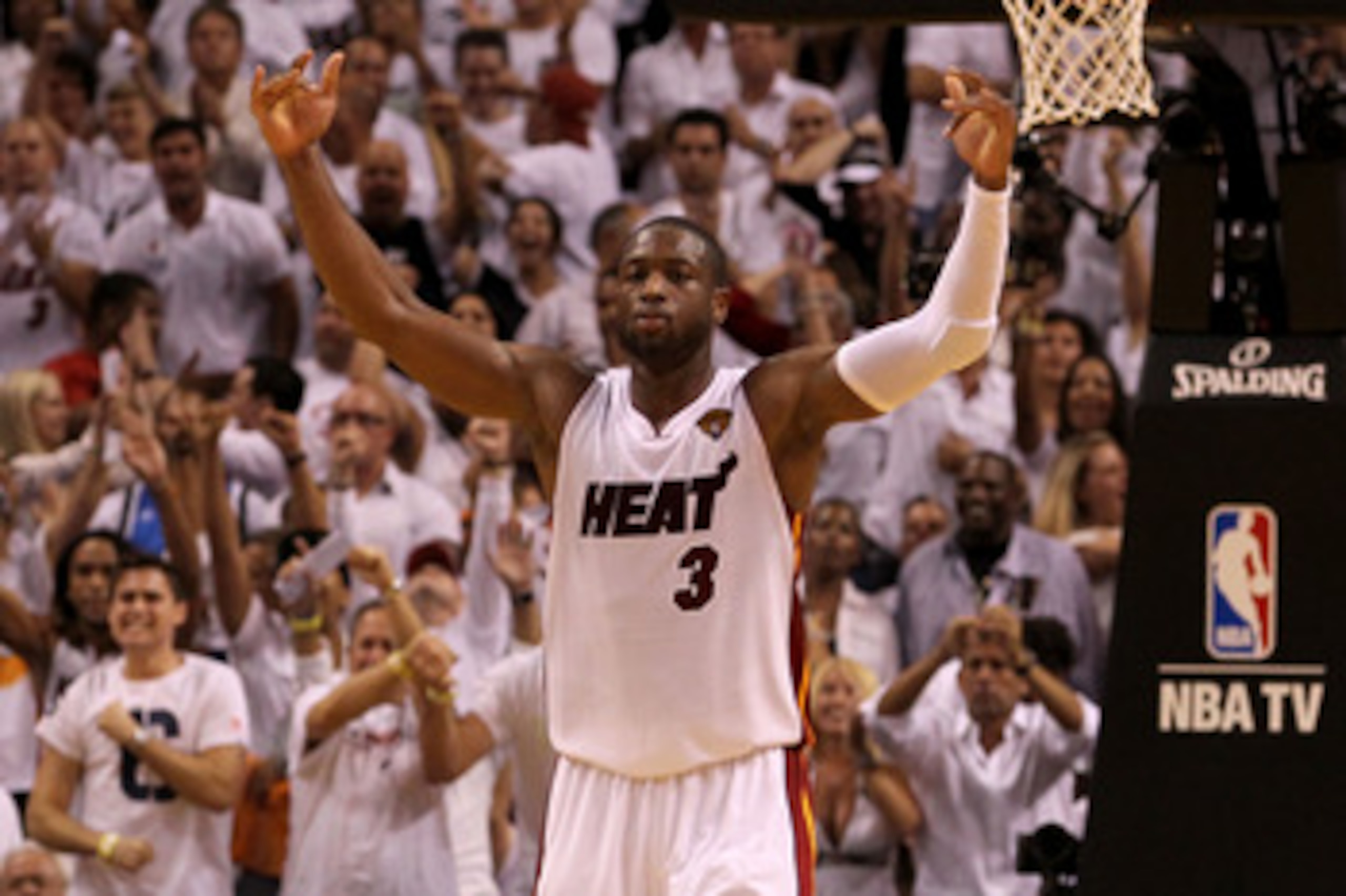 MIAMI, FL - JUNE 02:  Dwyane Wade #3 of the Miami Heat celebrates after he made a 3-point shot in the final minute of the fourth quarter to tie the game 93-93 against the Dallas Mavericks in Game Two of the 2011 NBA Finals at American Airlines Arena on Ju