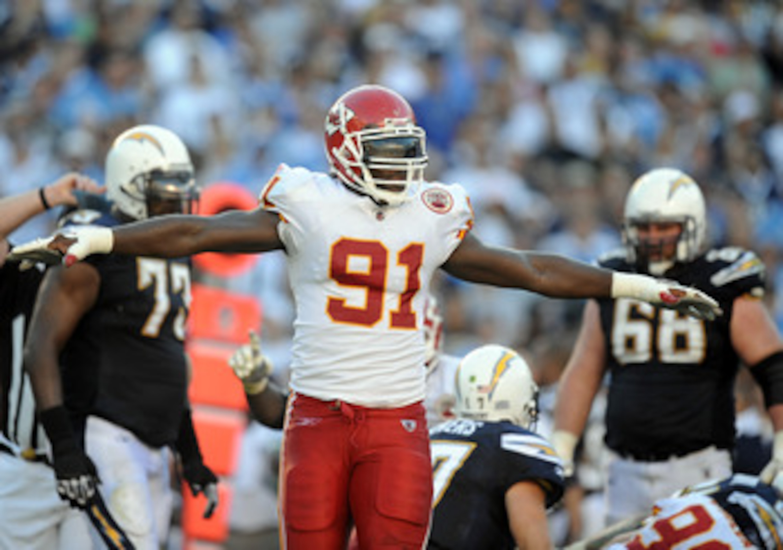 SAN DIEGO, CA - DECEMBER 12:  Tamba Hali #91 of the Kansas City Chiefs celebrates a stop on third down against the San Diego Chargers at Qualcomm Stadium on December 12, 2010 in San Diego, California.  (Photo by Harry How/Getty Images)