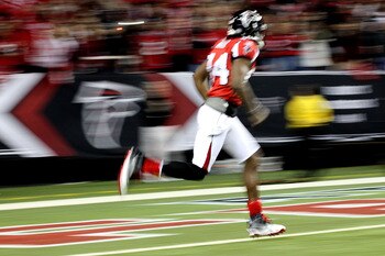 ATLANTA, GA - JANUARY 15:  Roddy White #84 of the Atlanta Falcons runs onto the field during player introducitons against the Green Bay Packers during their 2011 NFC divisional playoff game at Georgia Dome on January 15, 2011 in Atlanta, Georgia.  (Photo