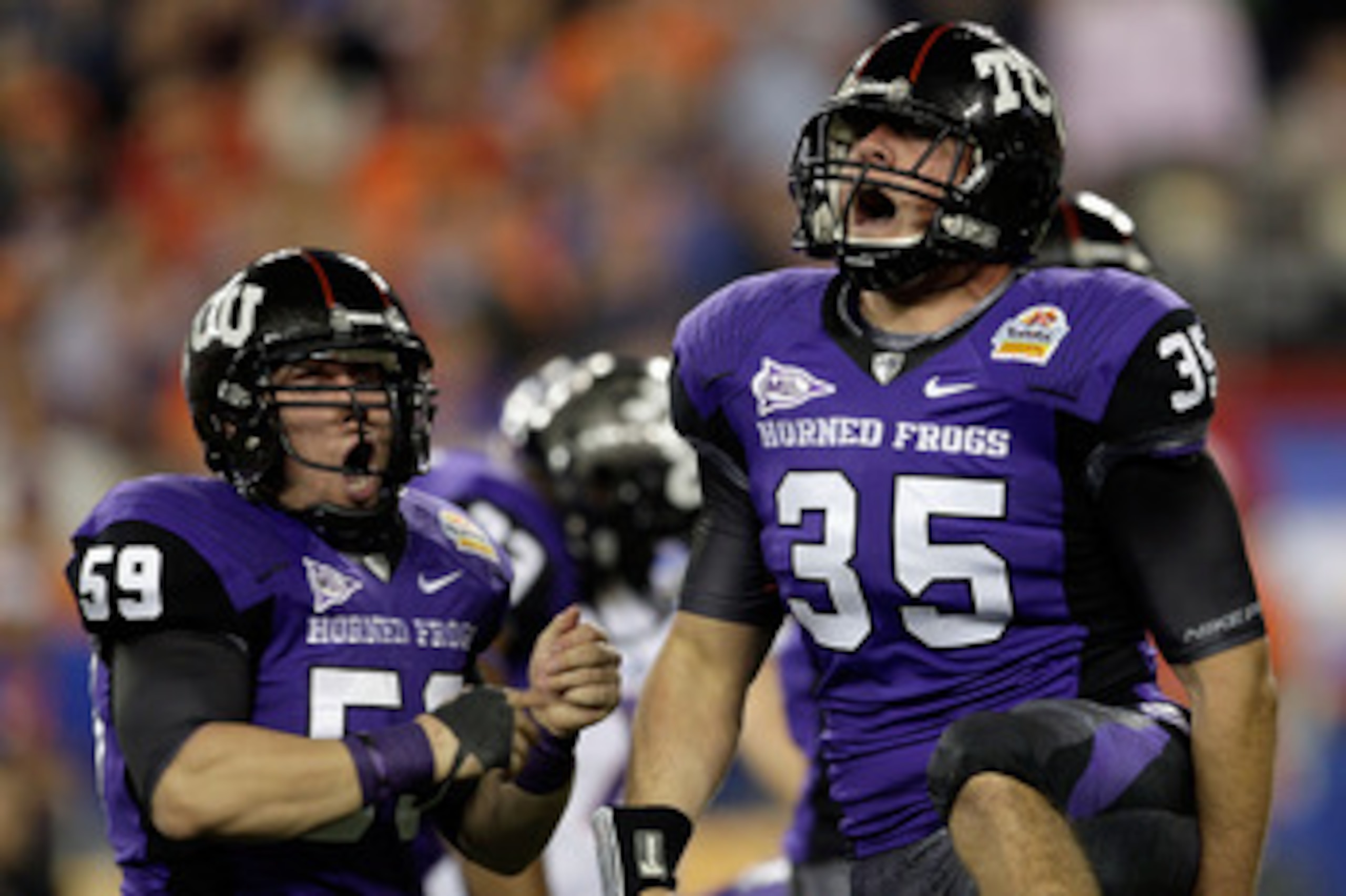 GLENDALE, AZ - JANUARY 04: (R-L) Tanner Brock #35 and Logan Sligar #59 of the TCU Horned Frogs react after making a tackle in the first half against the Boise State Broncos during the Tostitos Fiesta Bowl at the Universtity of Phoenix Stadium on January GLENDALE, AZ - JANUARY 04: (R-L) Tanner Brock #35 and Logan Sligar #59 of the TCU Horned Frogs react after making a tackle in the first half against the Boise State Broncos during the Tostitos Fiesta Bowl at the Universtity of Phoenix Stadium on January