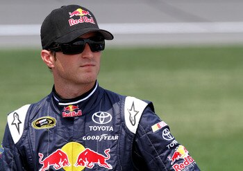 KANSAS CITY, KS - JUNE 04:  Kasey Kahne, driver of the #4 Red Bull Toyota, stands on the grid during qualifying for the NASCAR Sprint Cup Series STP 400 at Kansas Speedway on June 4, 2011 in Kansas City, Kansas.  (Photo by Jerry Markland/Getty Images for 