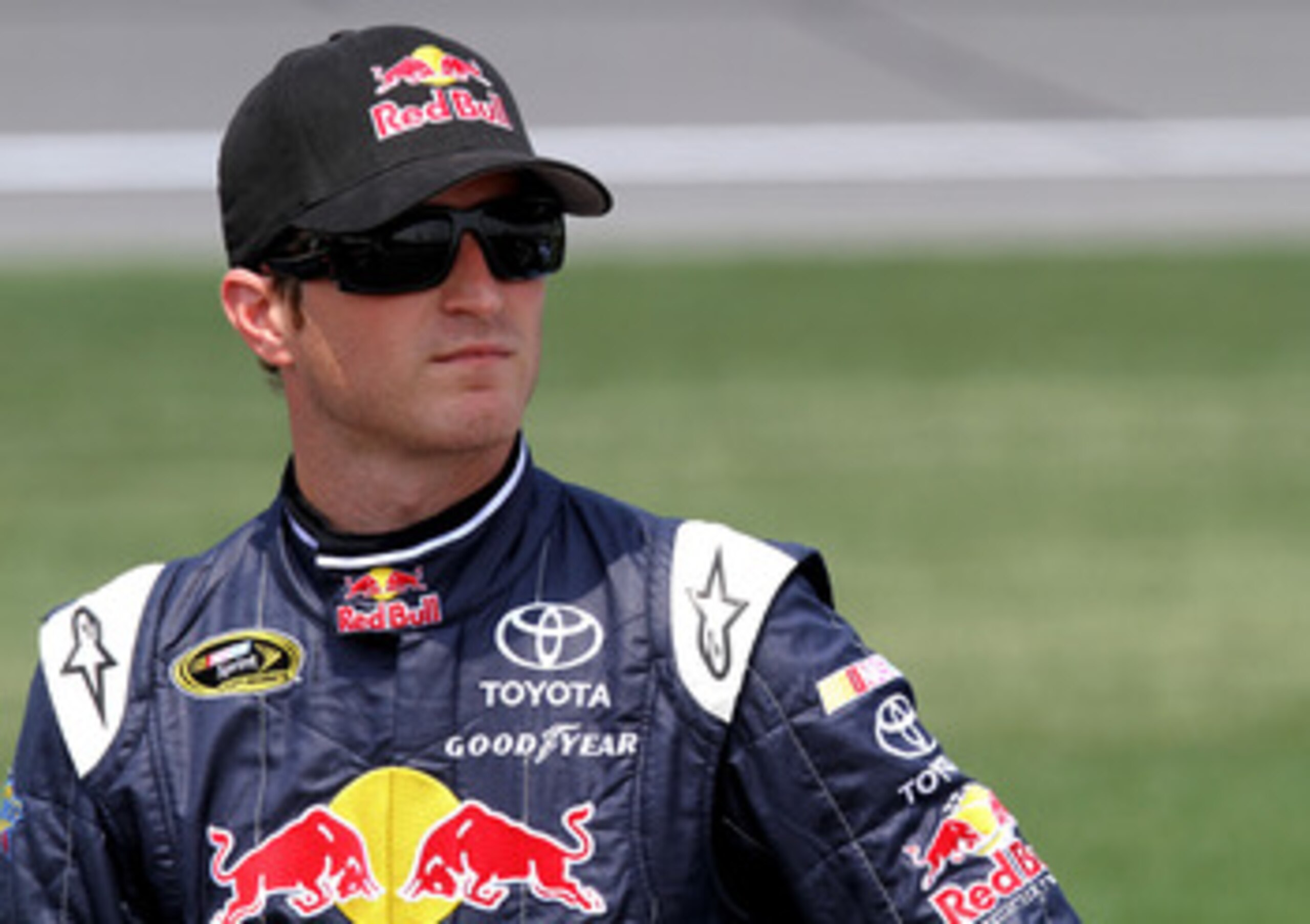 KANSAS CITY, KS - JUNE 04:  Kasey Kahne, driver of the #4 Red Bull Toyota, stands on the grid during qualifying for the NASCAR Sprint Cup Series STP 400 at Kansas Speedway on June 4, 2011 in Kansas City, Kansas.  (Photo by Jerry Markland/Getty Images for 